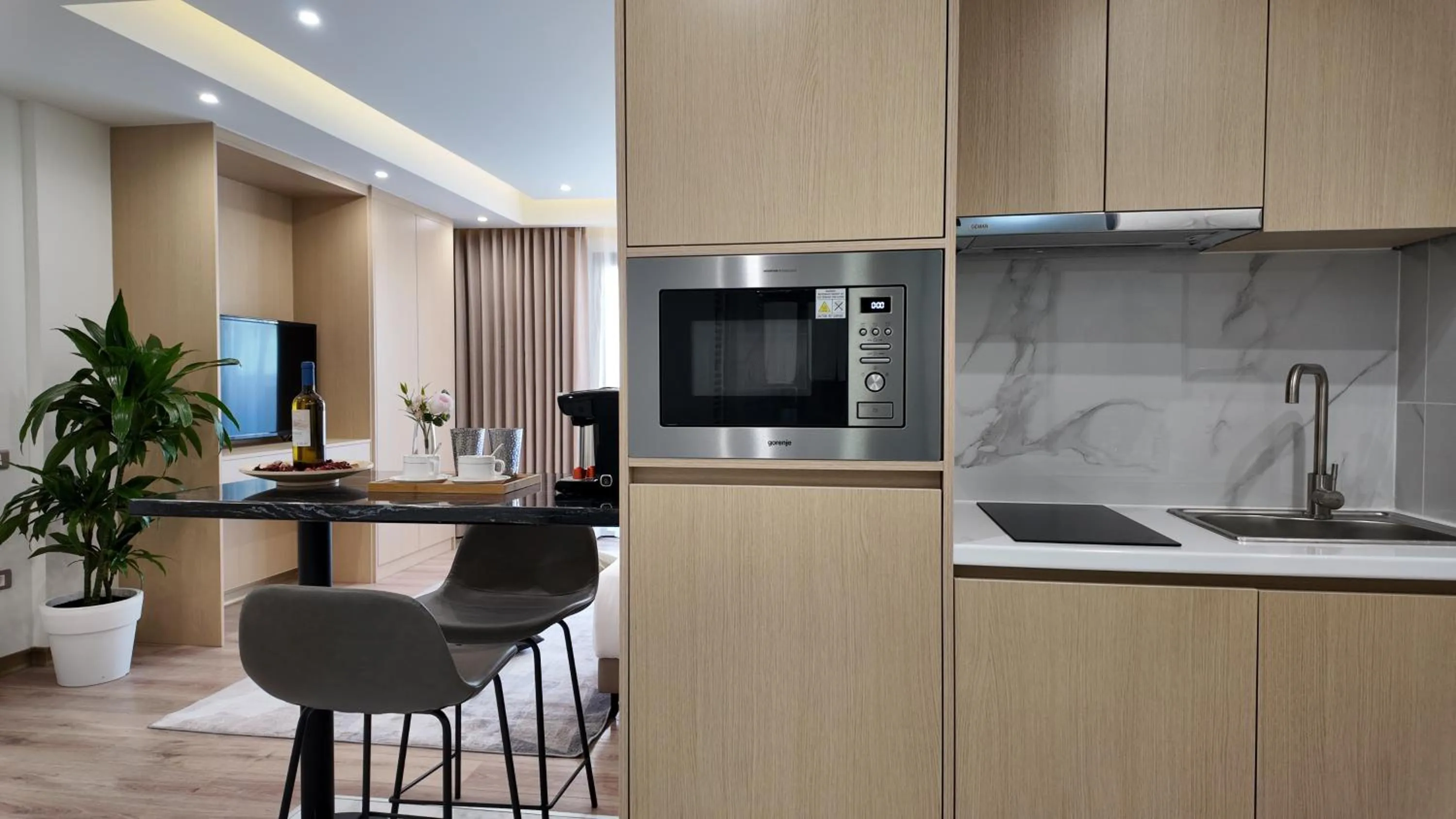Kitchen or kitchenette in CC LUX Suites in Piraeus Port
