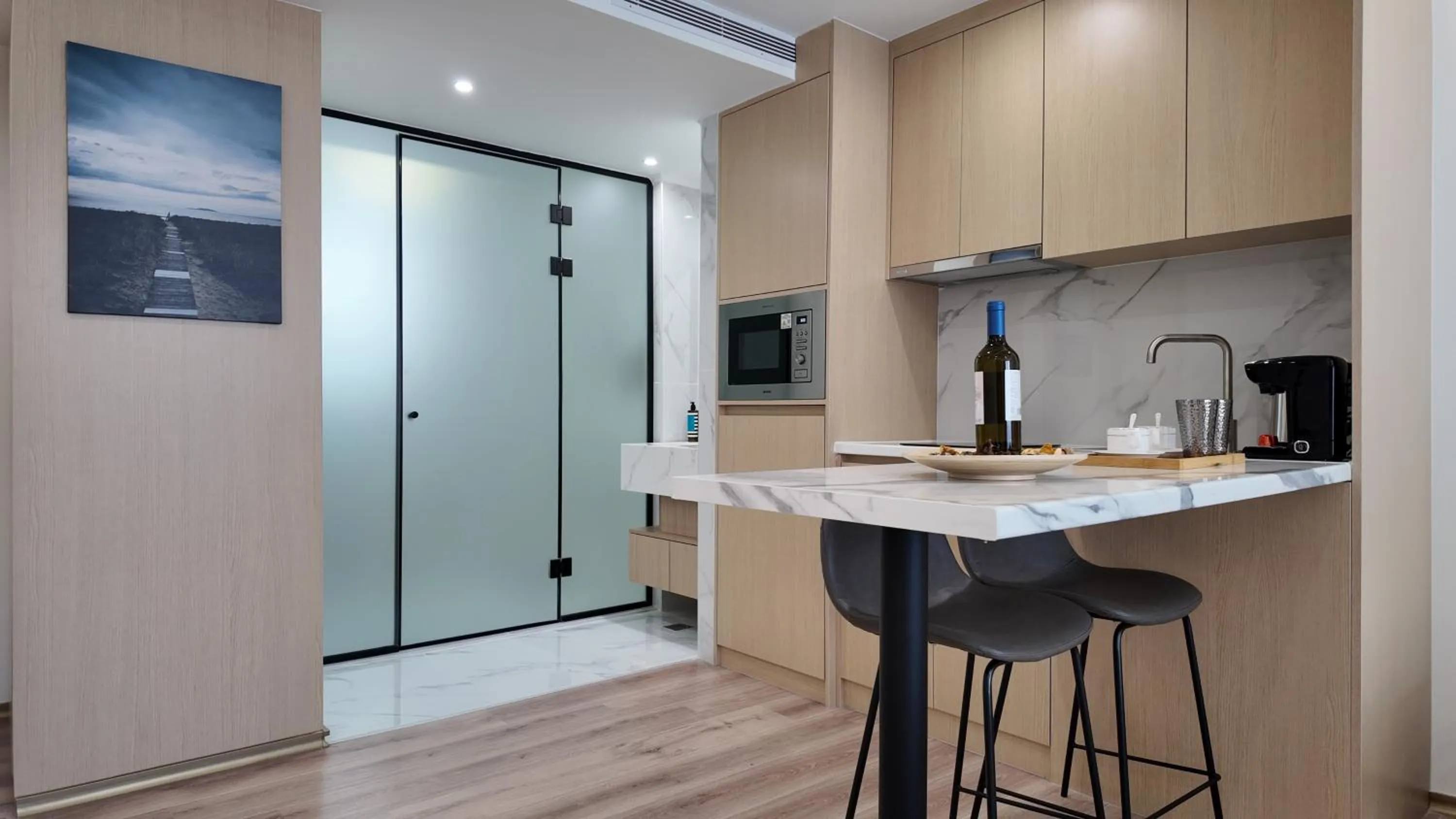 Kitchen or kitchenette in CC LUX Suites in Piraeus Port