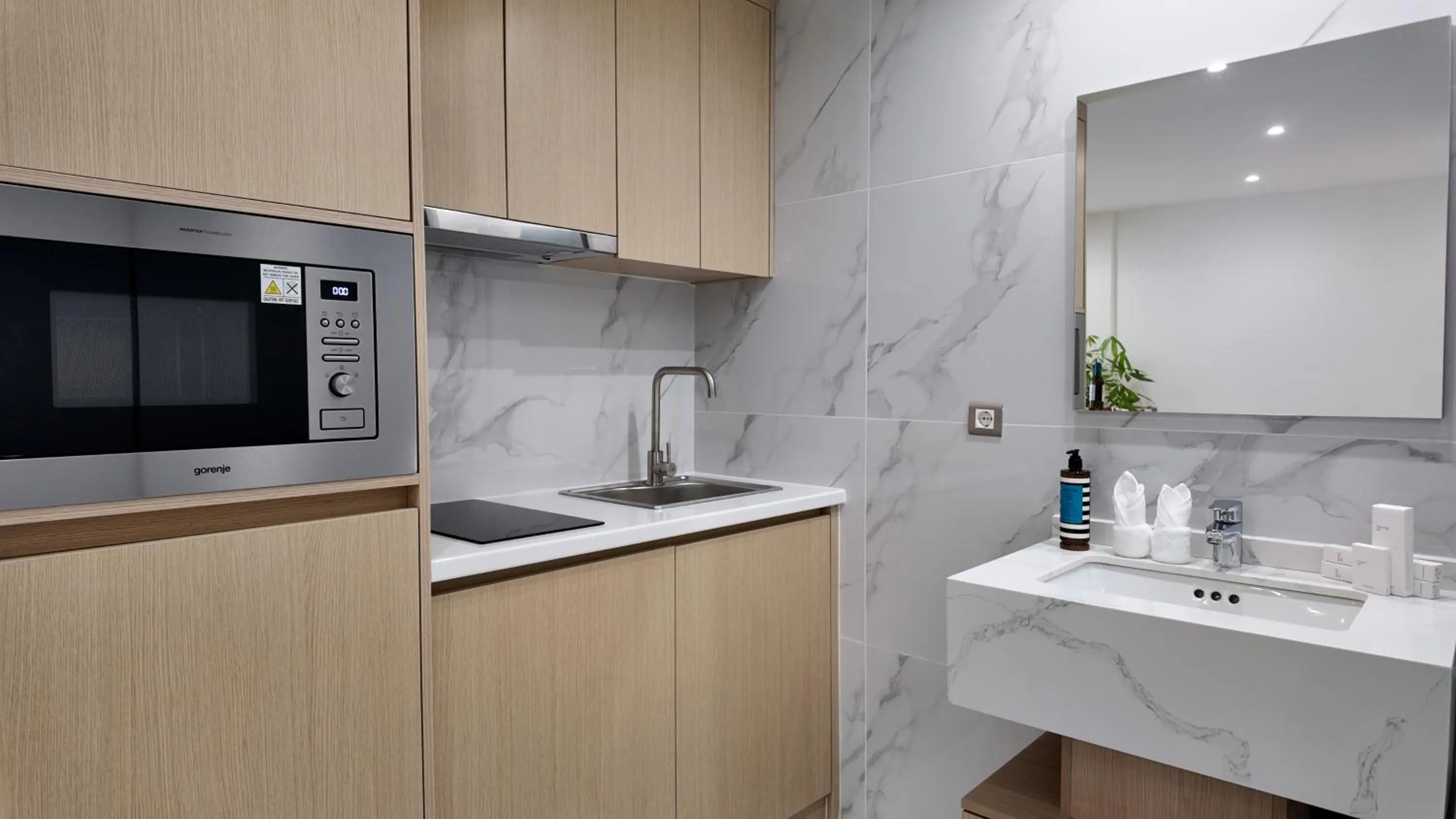 Kitchen or kitchenette in CC LUX Suites in Piraeus Port