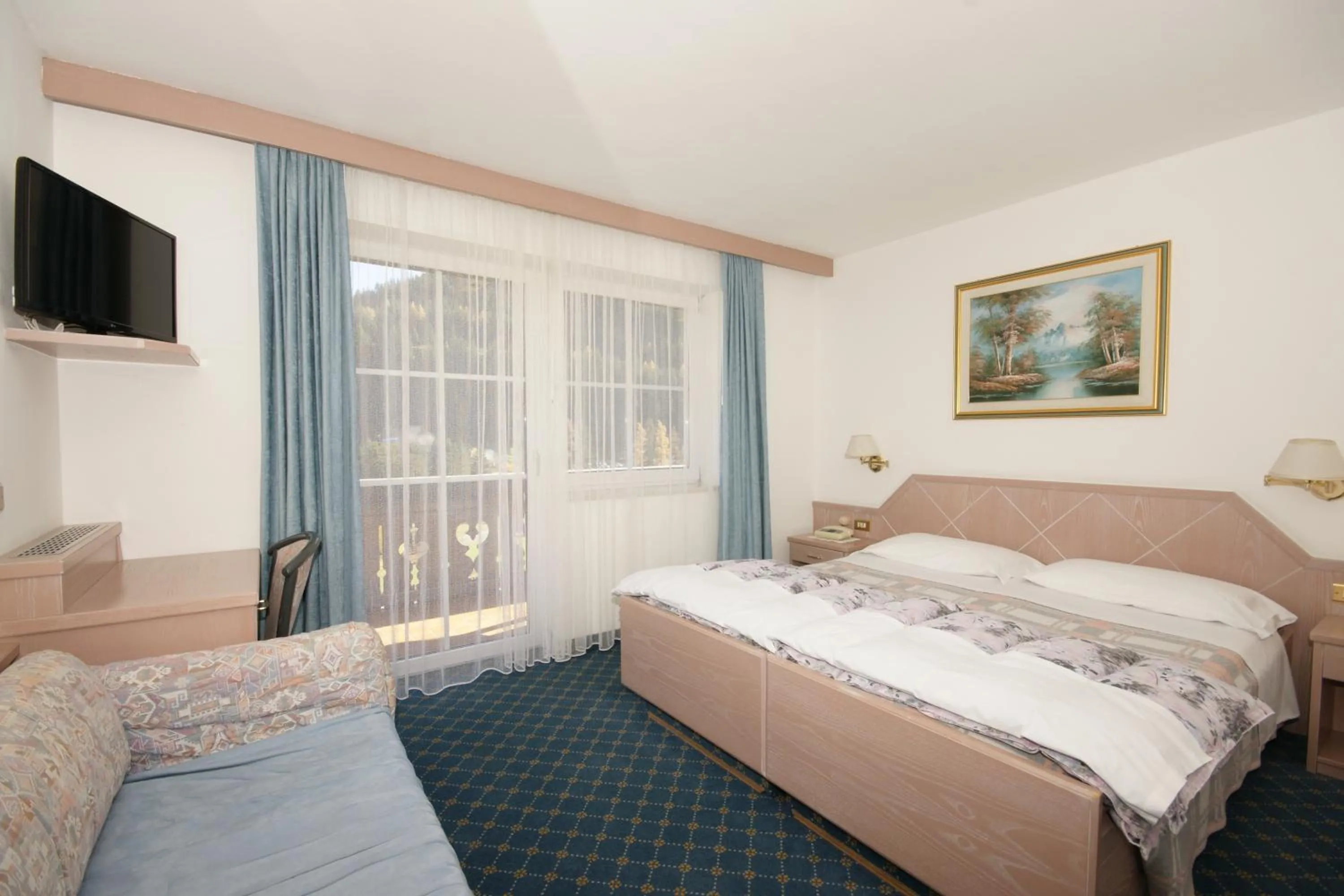 Bed in Hotel Villa Mozart