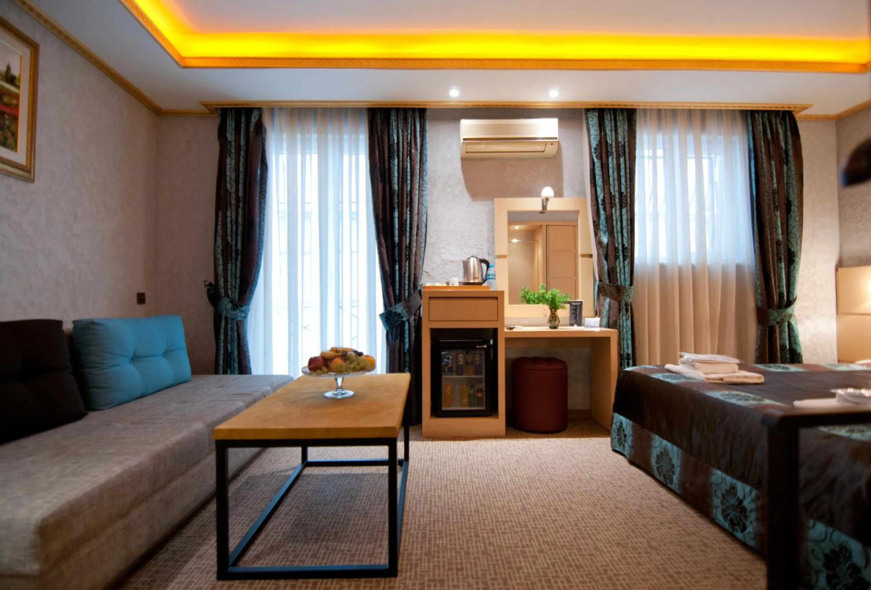 Coffee/tea facilities, Bed in Grand Ambiance Hotel