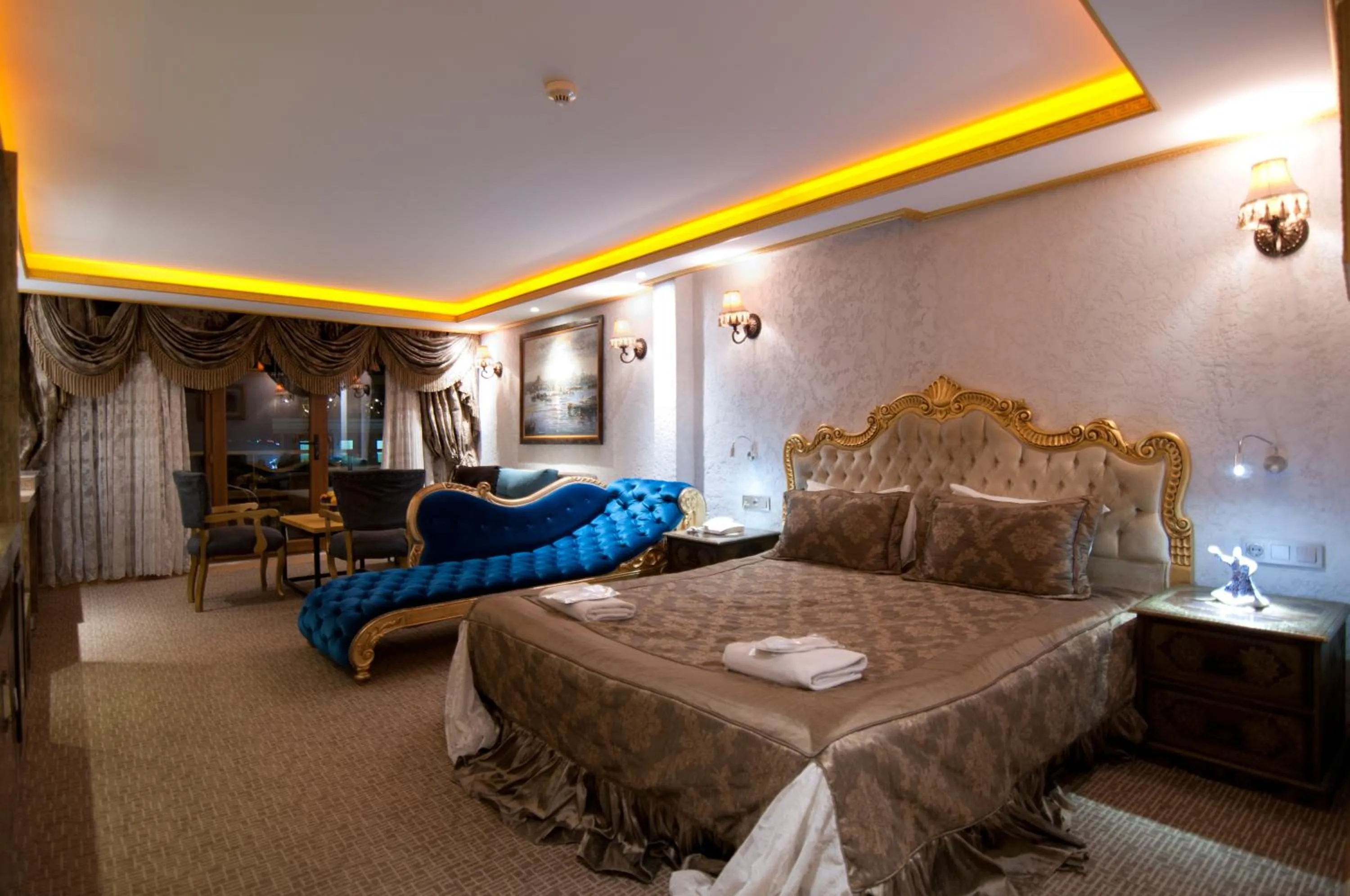 Photo of the whole room, Bed in Grand Ambiance Hotel