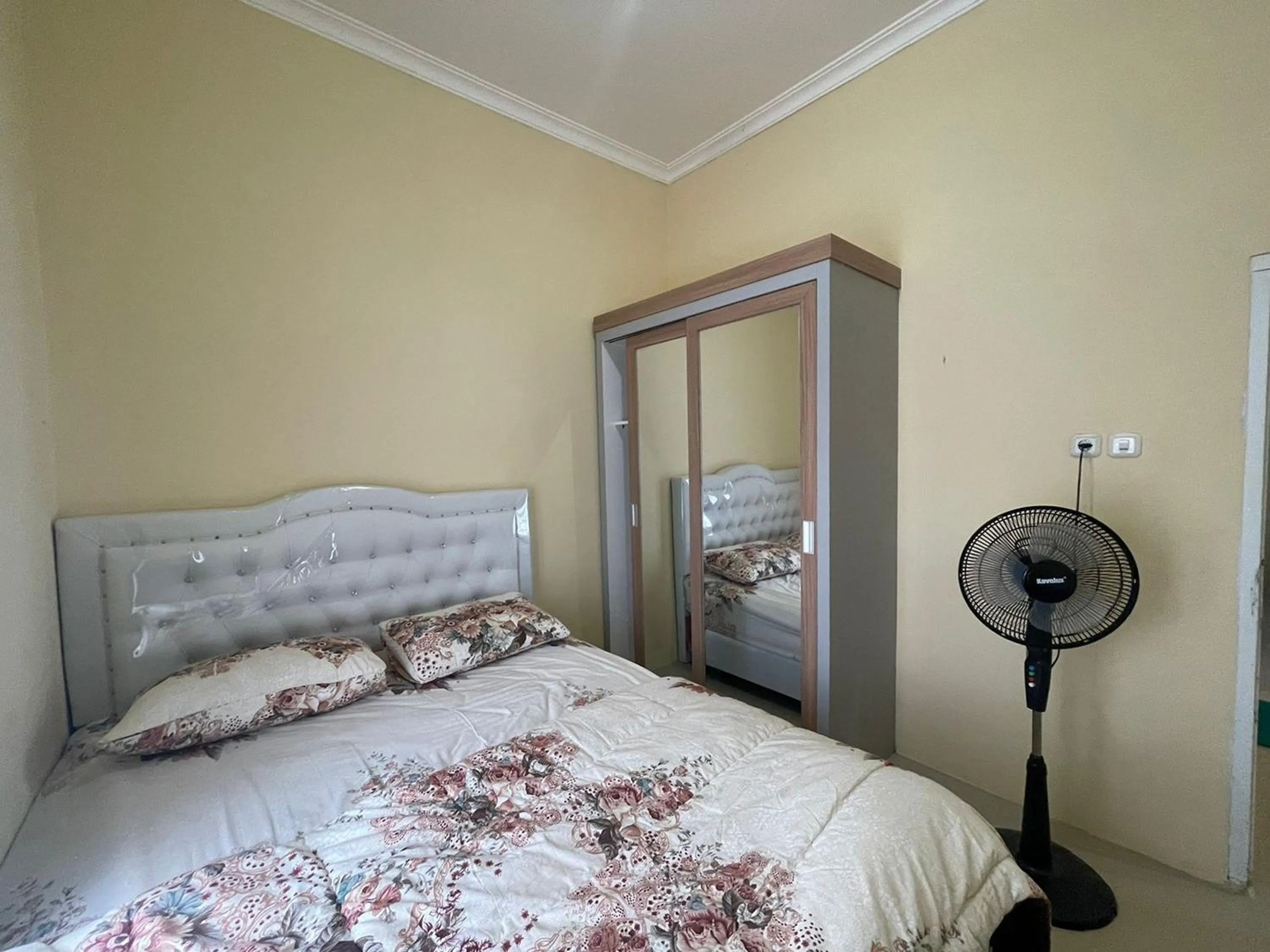 Bed in Villa Palacios Syari'ah Bukittinggi