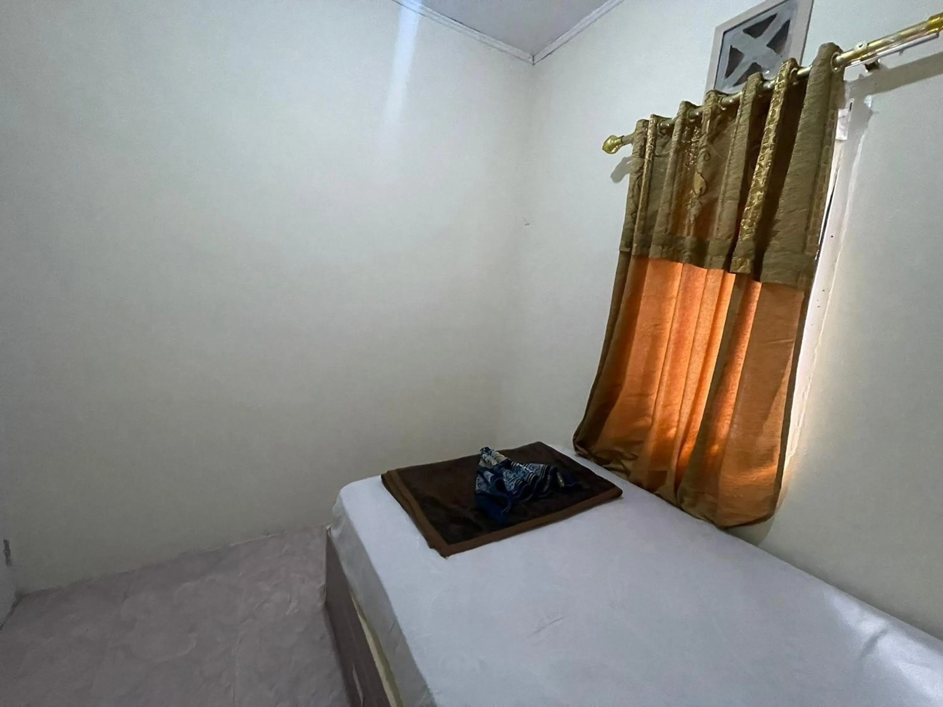 Bed in Villa Palacios Syari'ah Bukittinggi