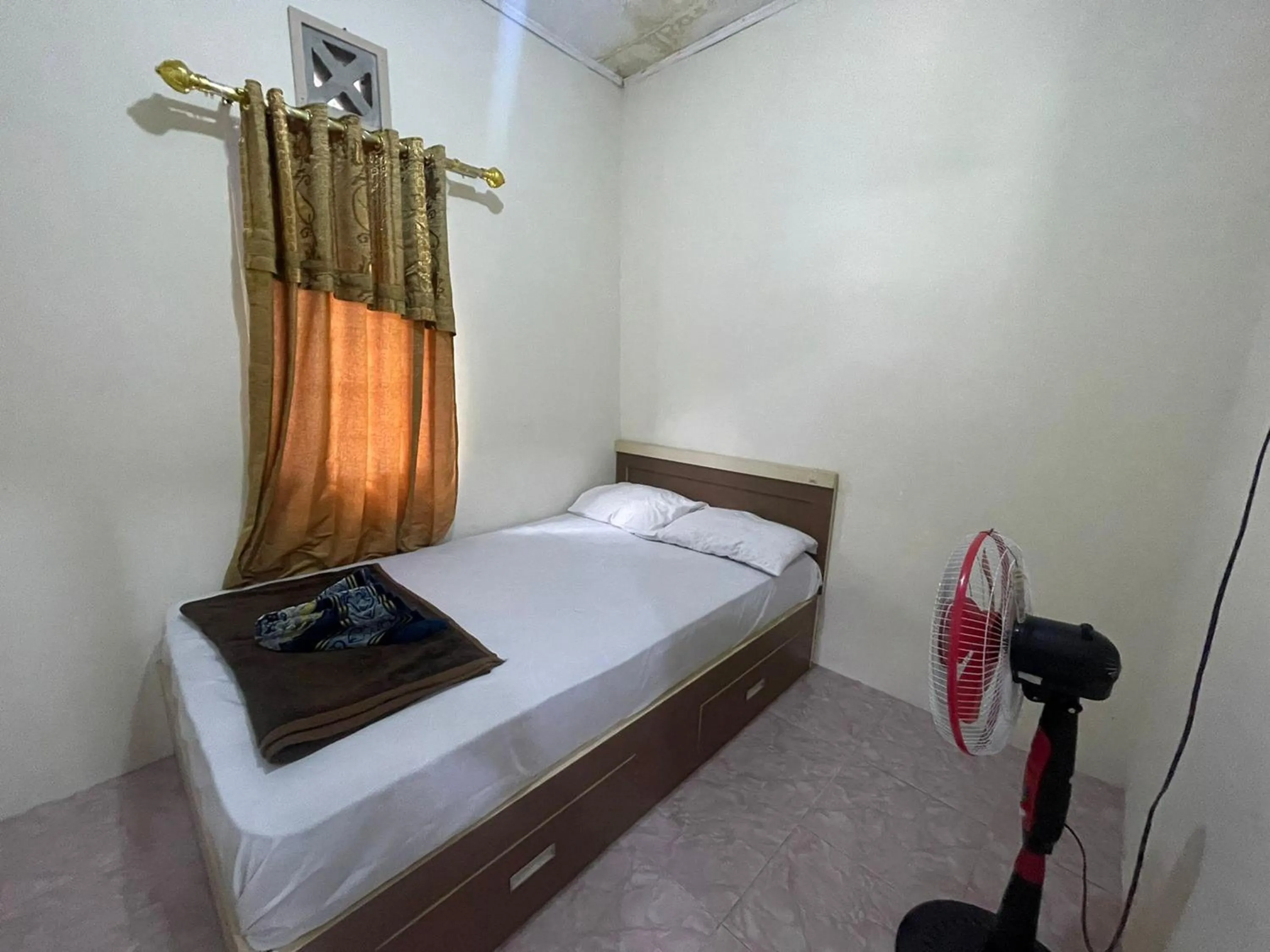 Bed in Villa Palacios Syari'ah Bukittinggi