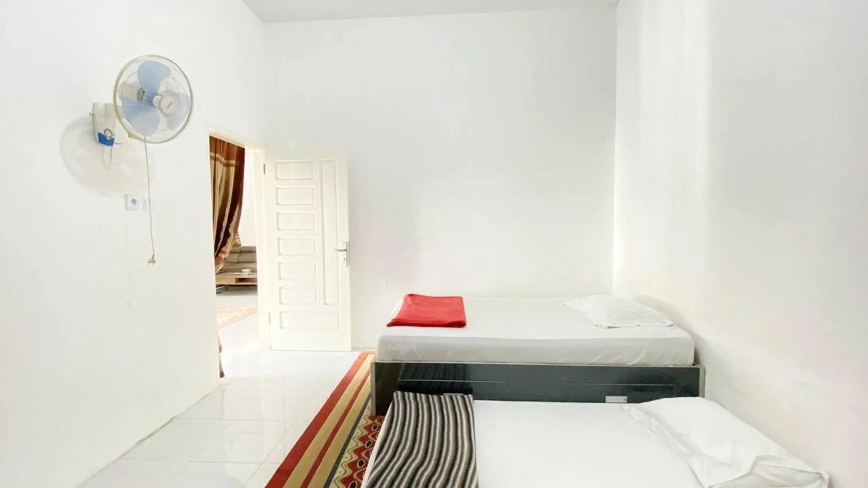 Bed in Villa Palacios Syari'ah Bukittinggi