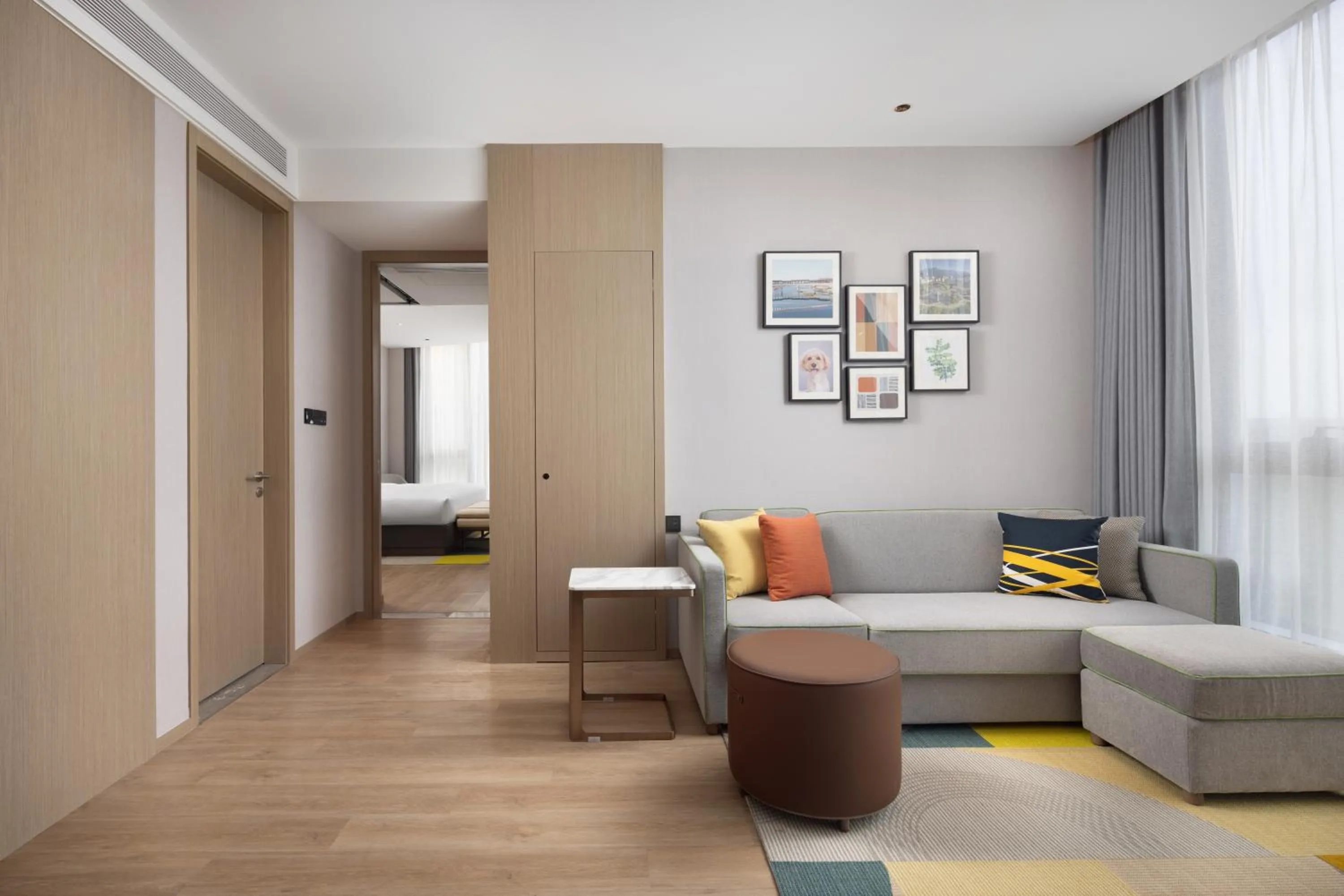 Living room in Home2 Suite by Hilton Yiwu World Trade Center