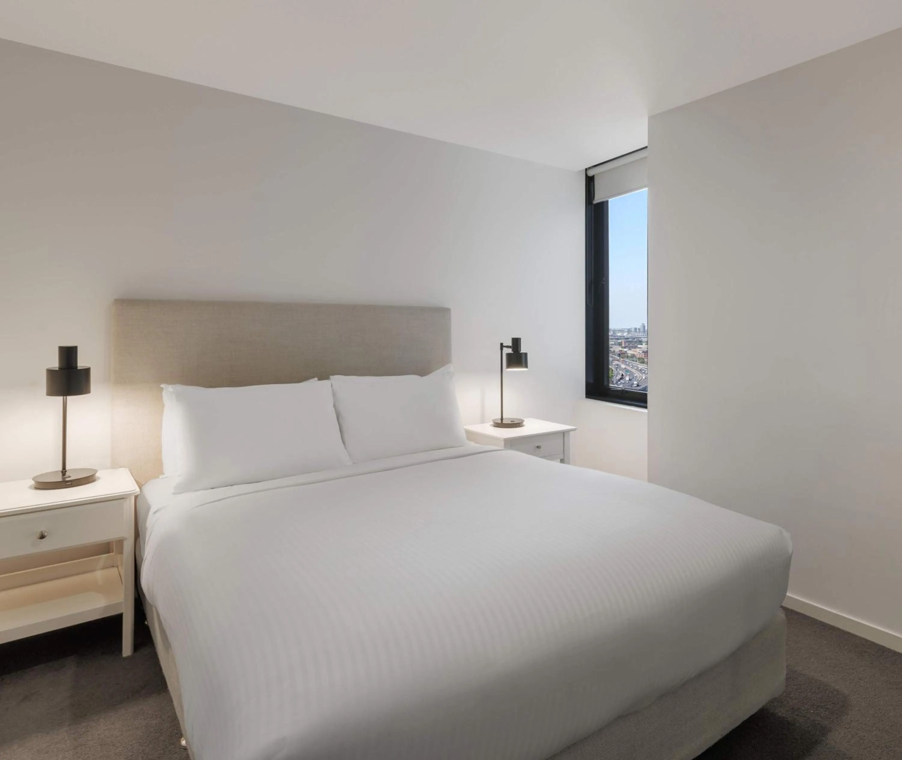 Bed in Oaks Melbourne Flemington Suites