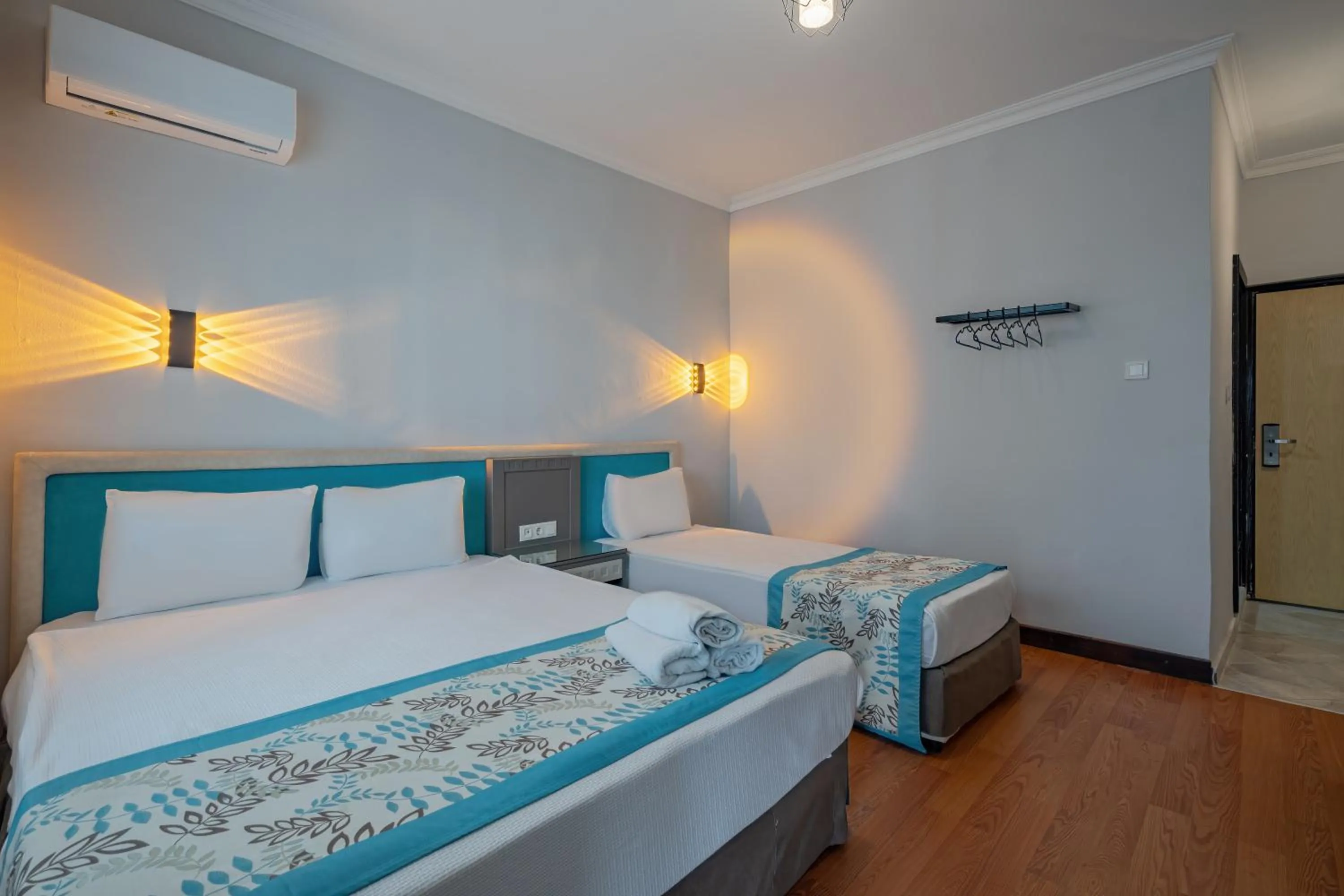 Bed in Side Nusso Beach Club - All Inclusive