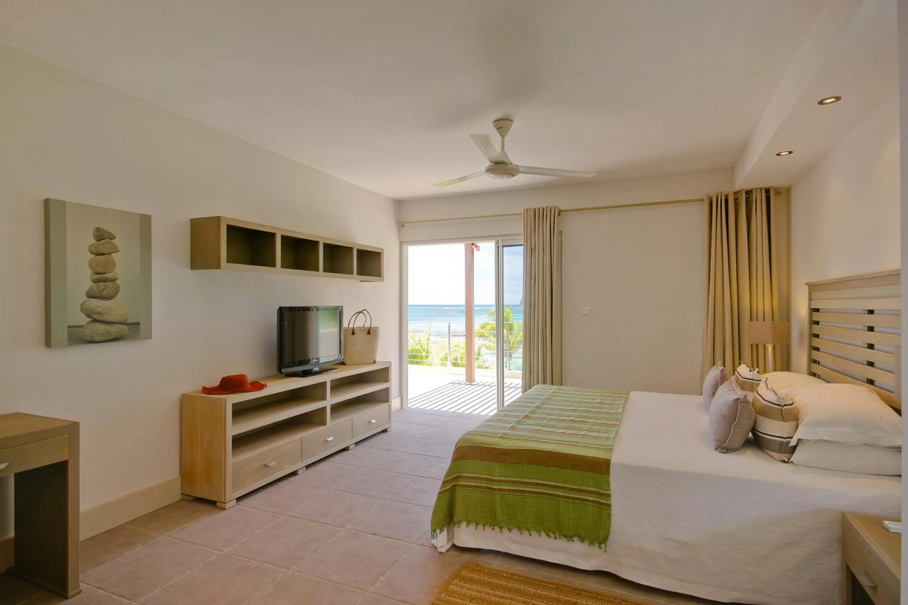 Photo of the whole room, Bed in Cape Point Seafront by LOV Mauritius