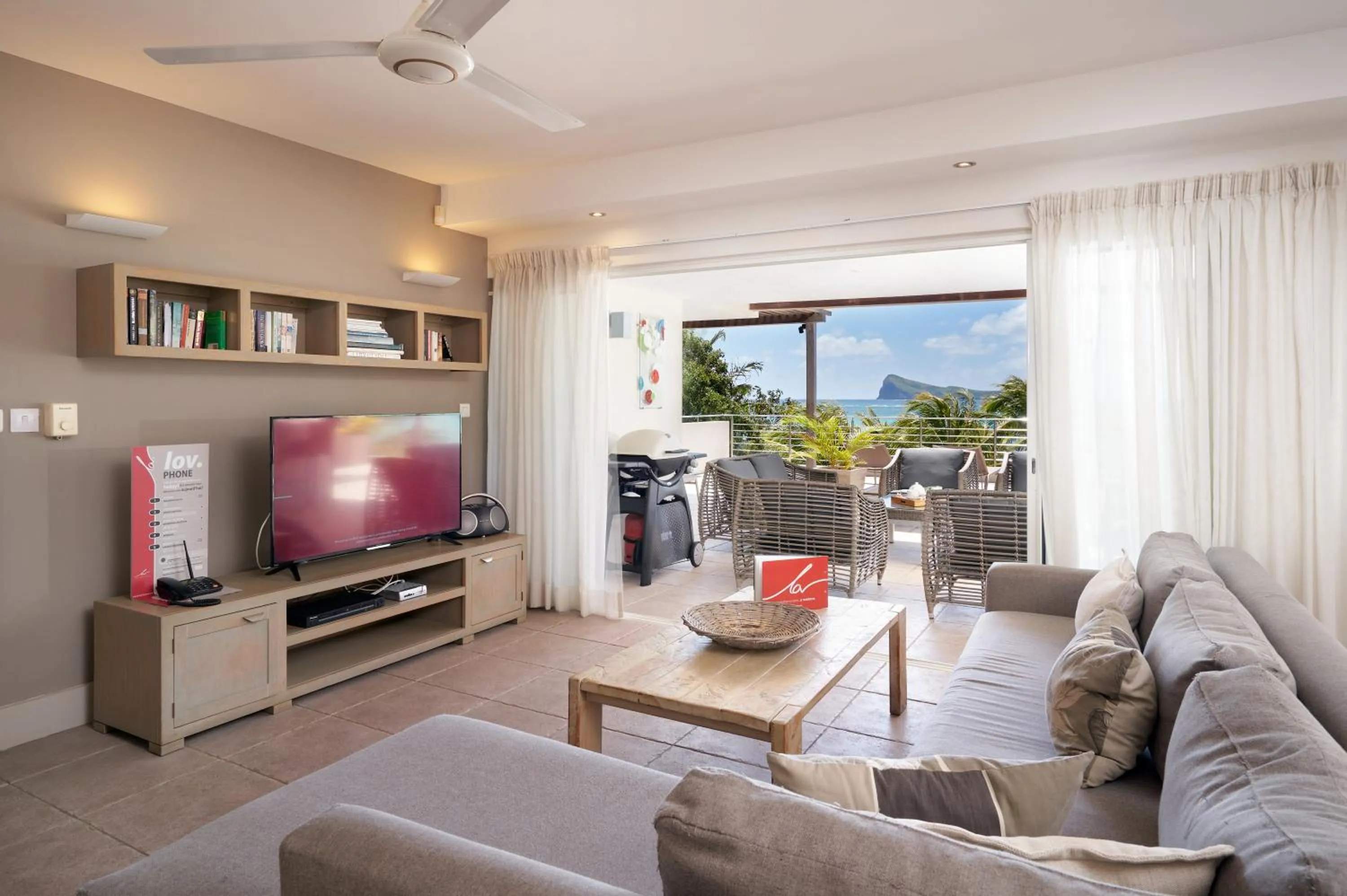 Living room in Cape Point Seafront by LOV Mauritius