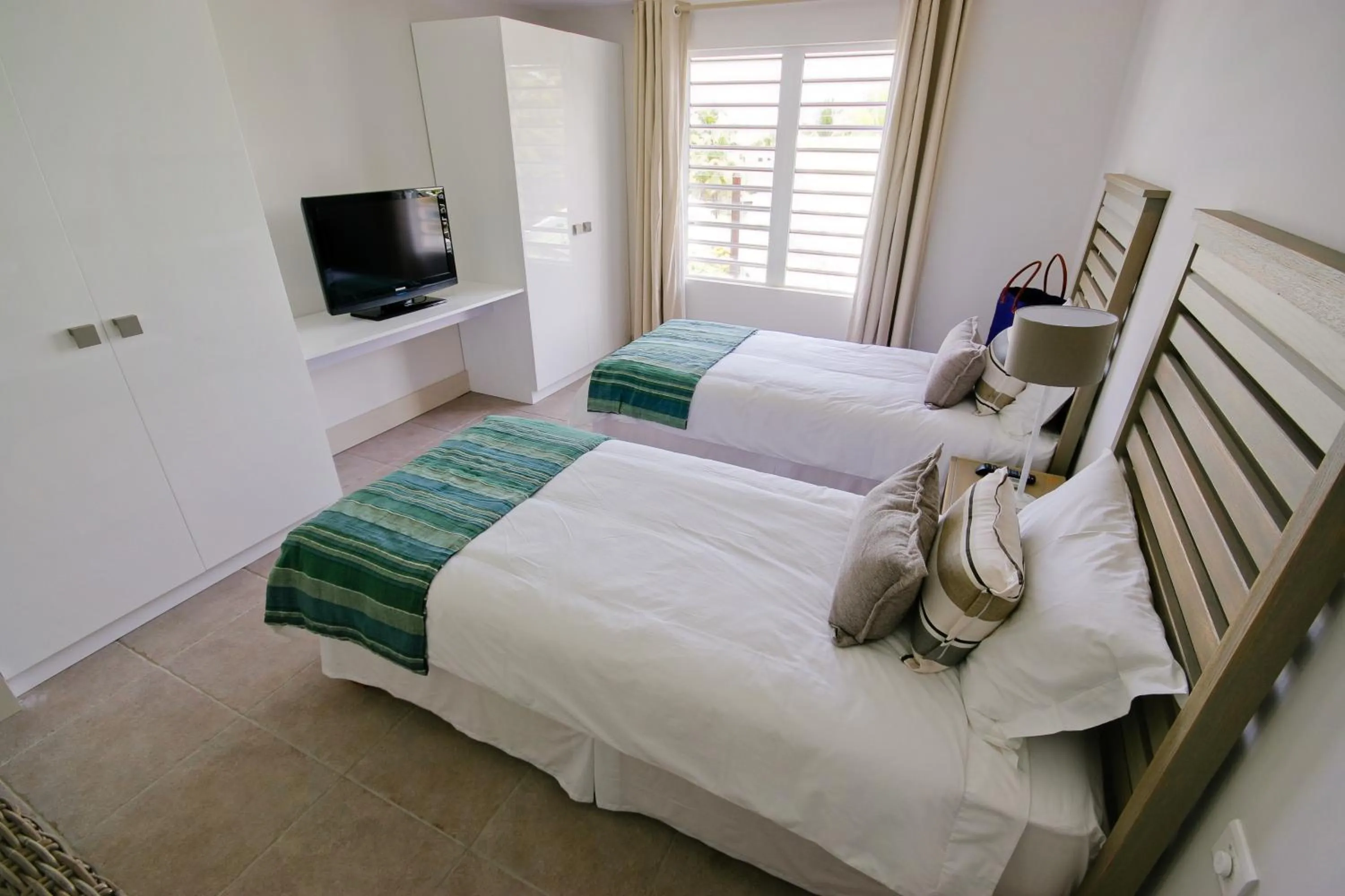 Photo of the whole room, Bed in Cape Point Seafront by LOV Mauritius