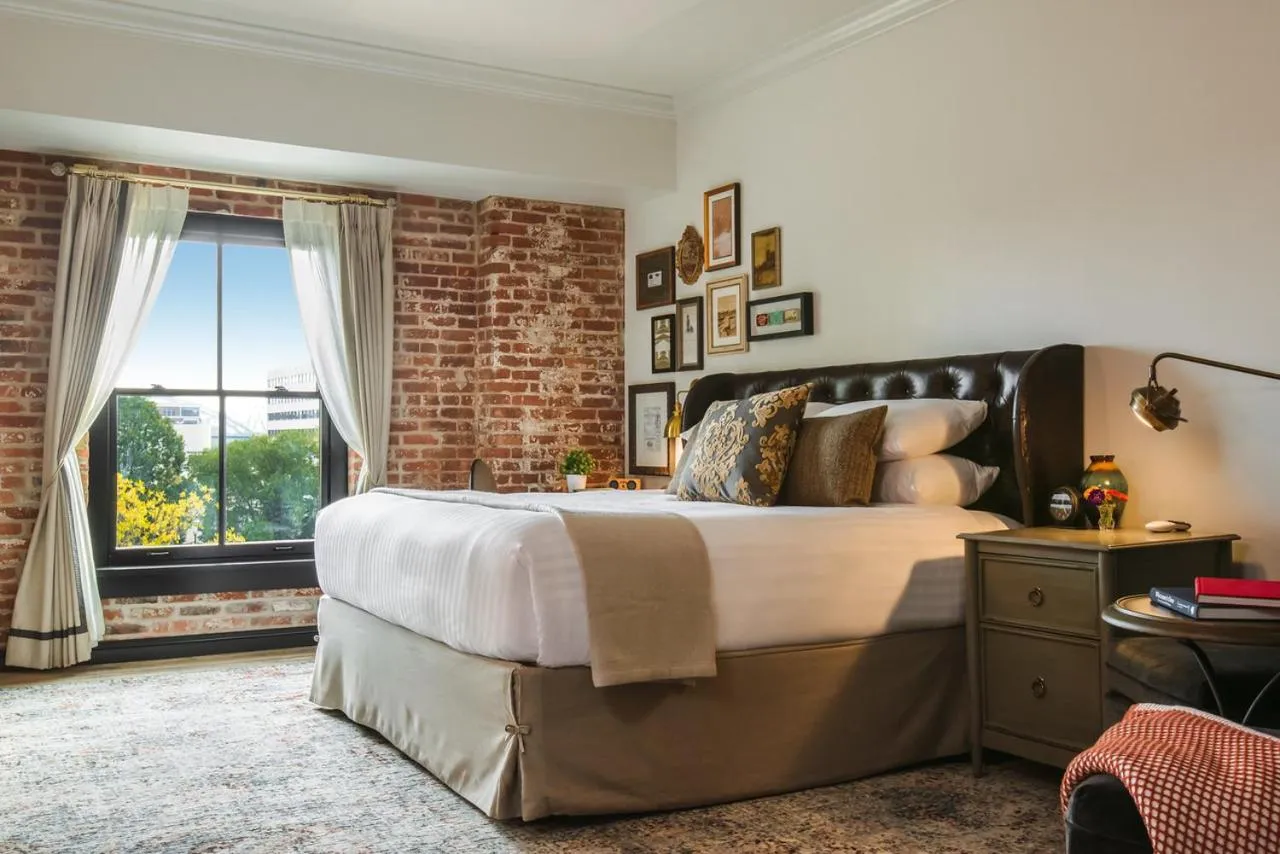 Bed in The Charmant Hotel