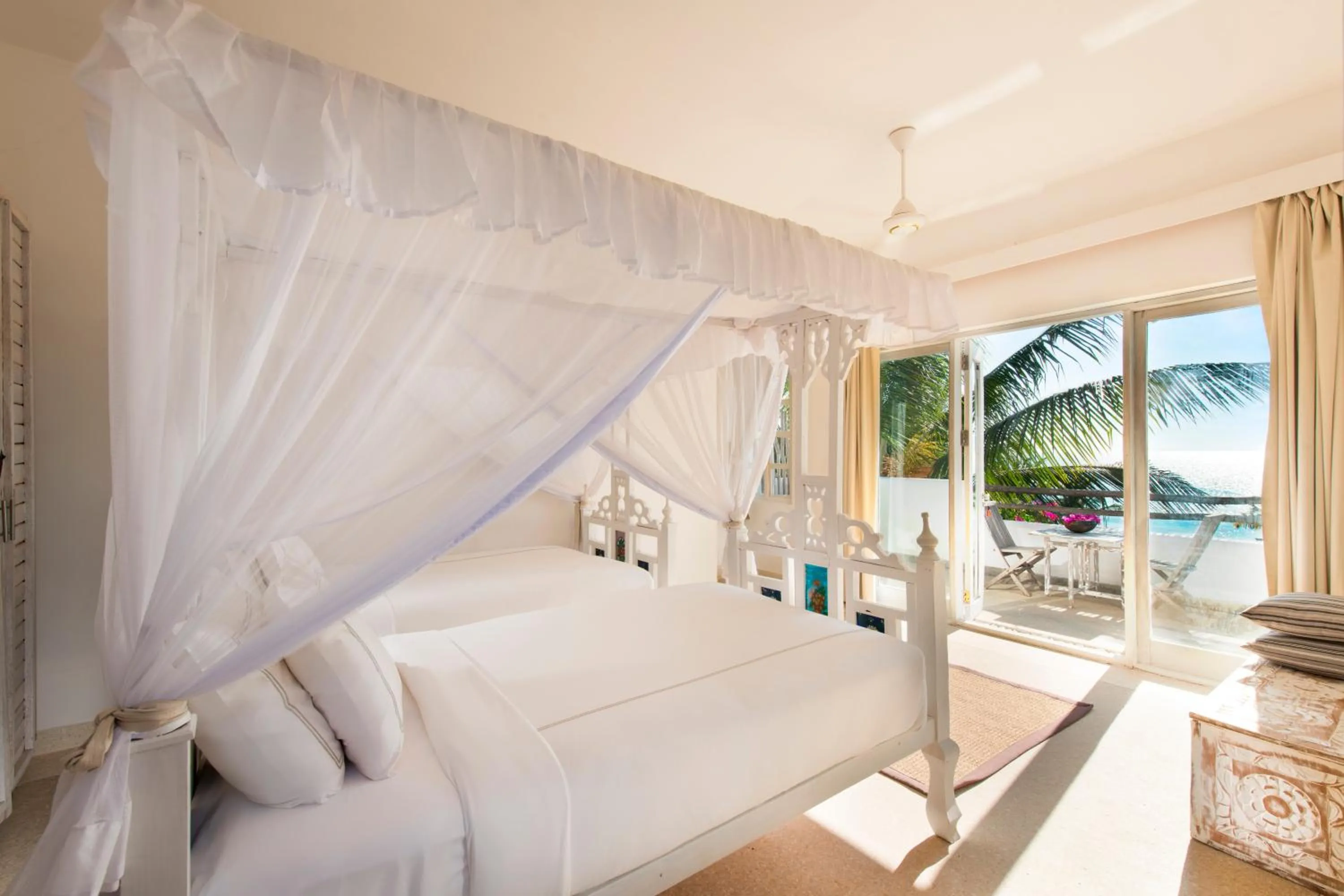 Bed in The Aiyana Resort & Spa