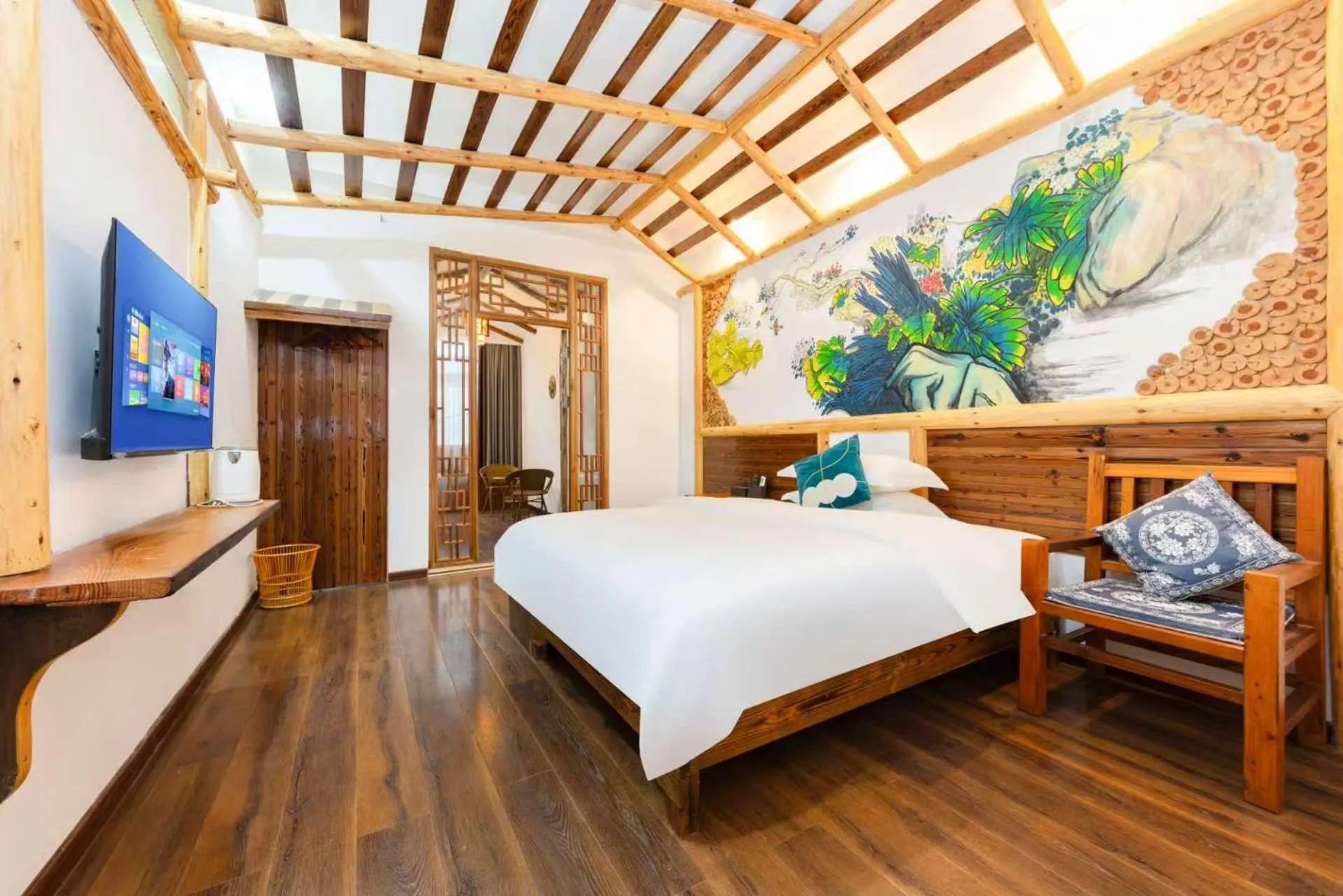 Photo of the whole room, Bed in Hotel California Zhangjiajie
