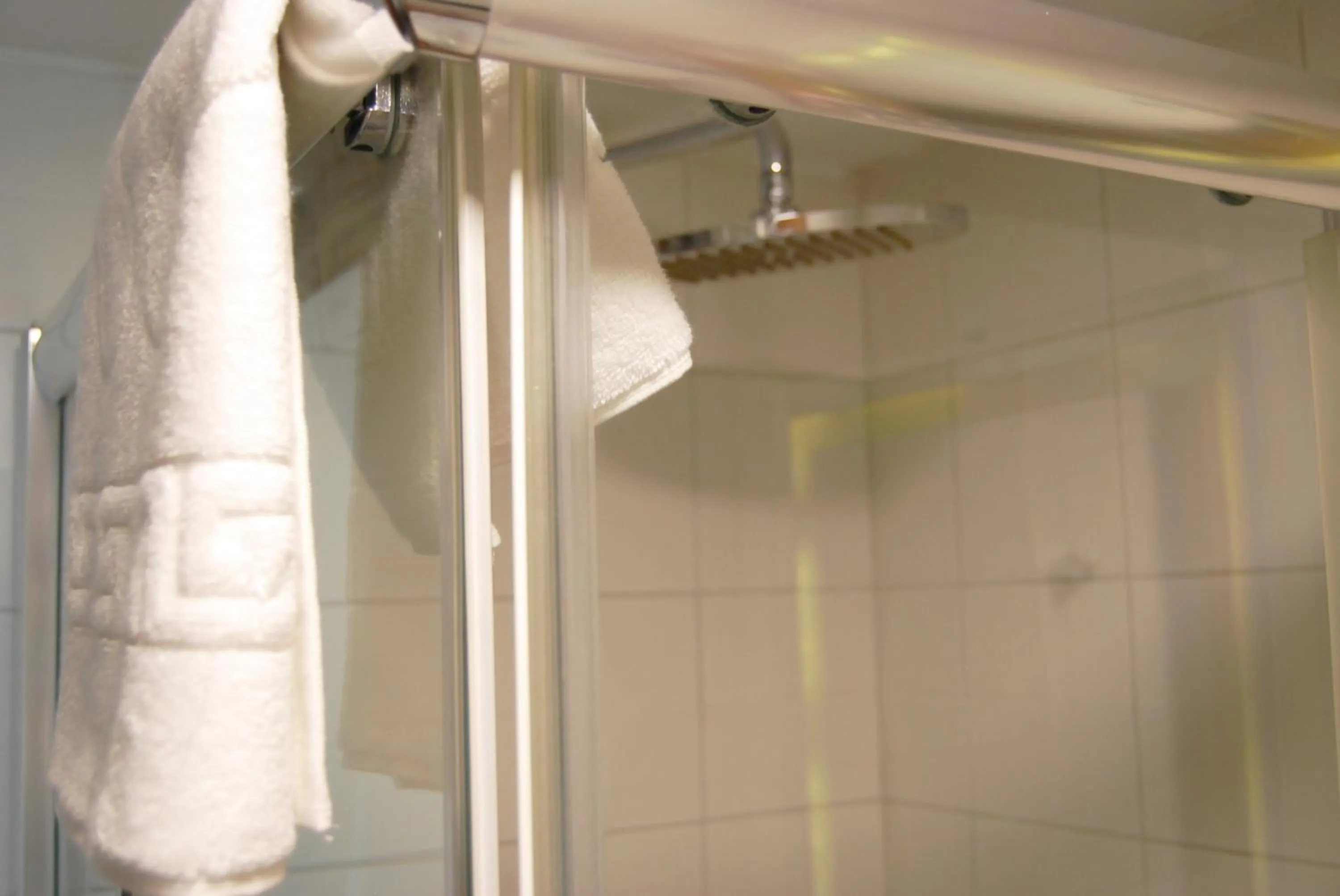 Shower in All Inn Hotel