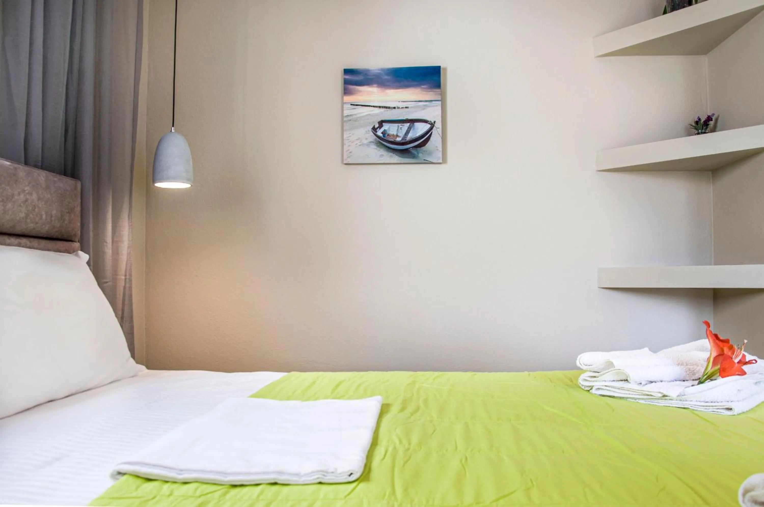 Photo of the whole room, Bed in Christina Rooms