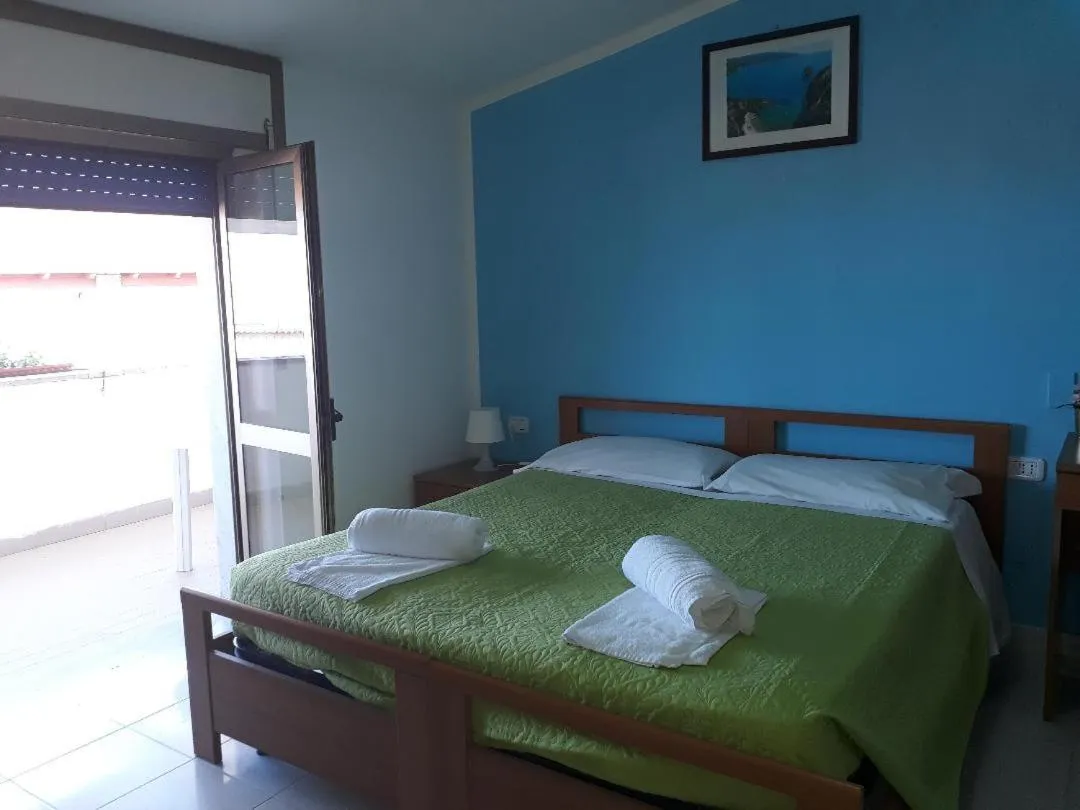 Bed in Pensione Nettuno