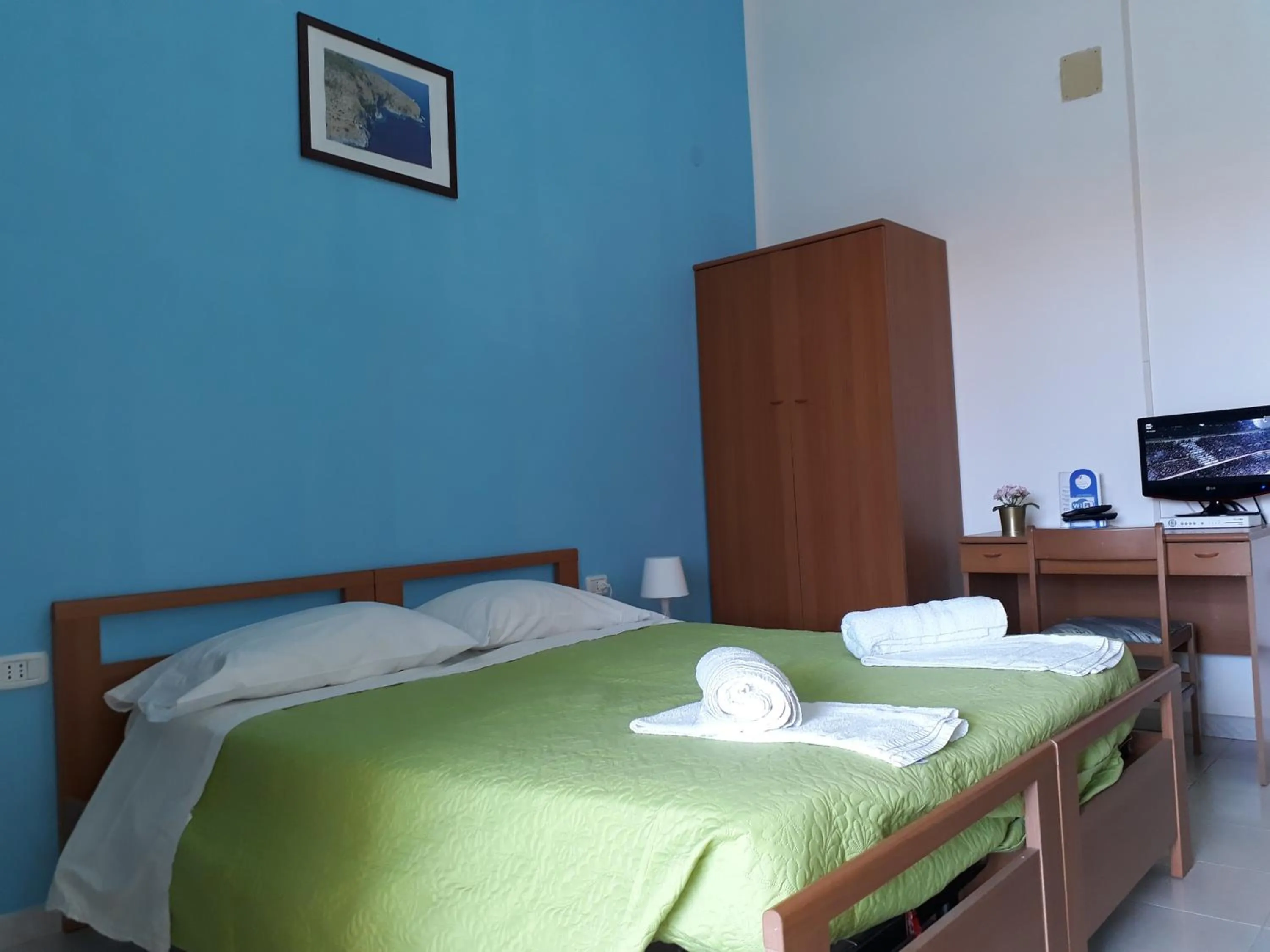 Bed in Pensione Nettuno