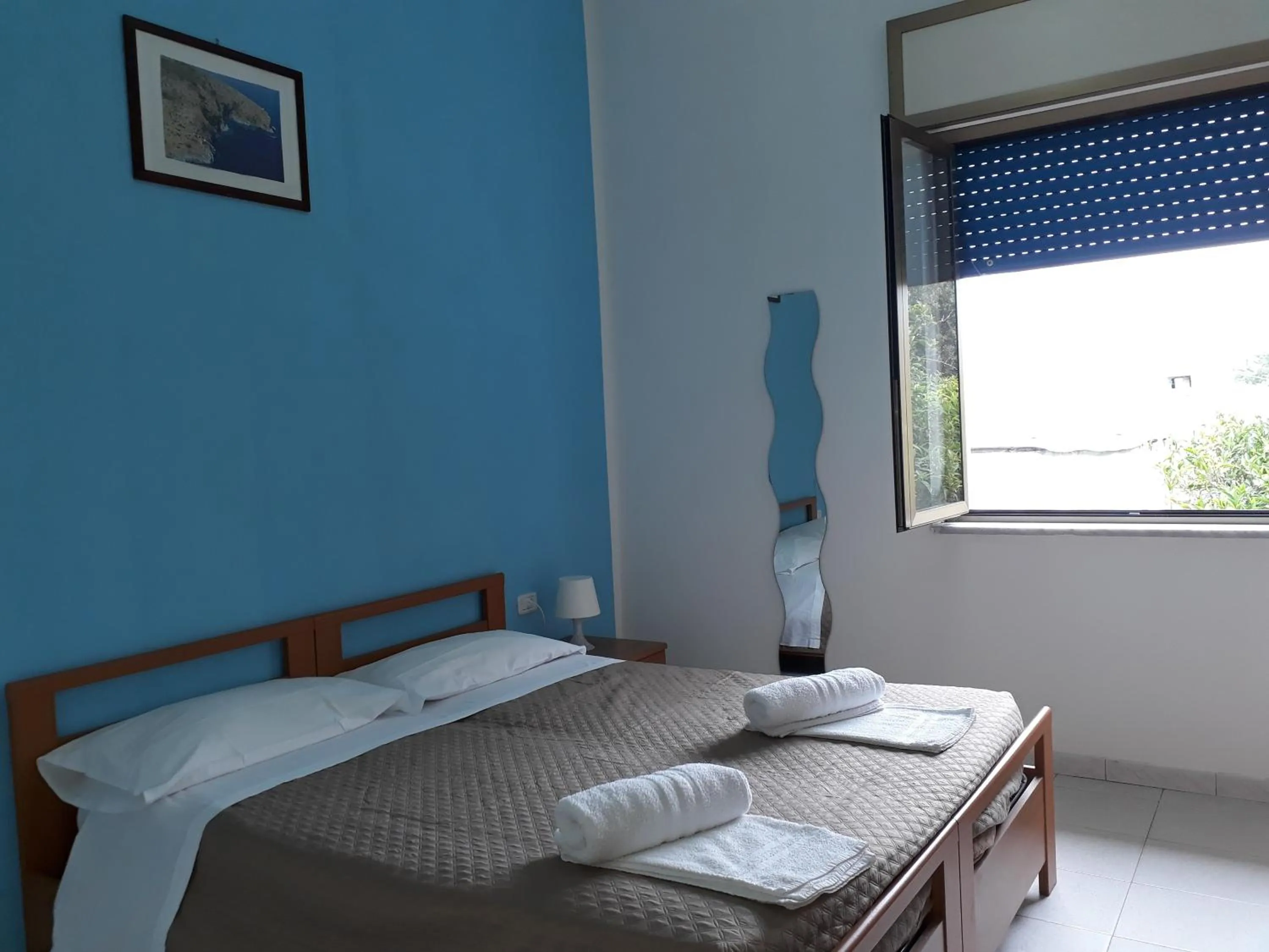 Bed in Pensione Nettuno