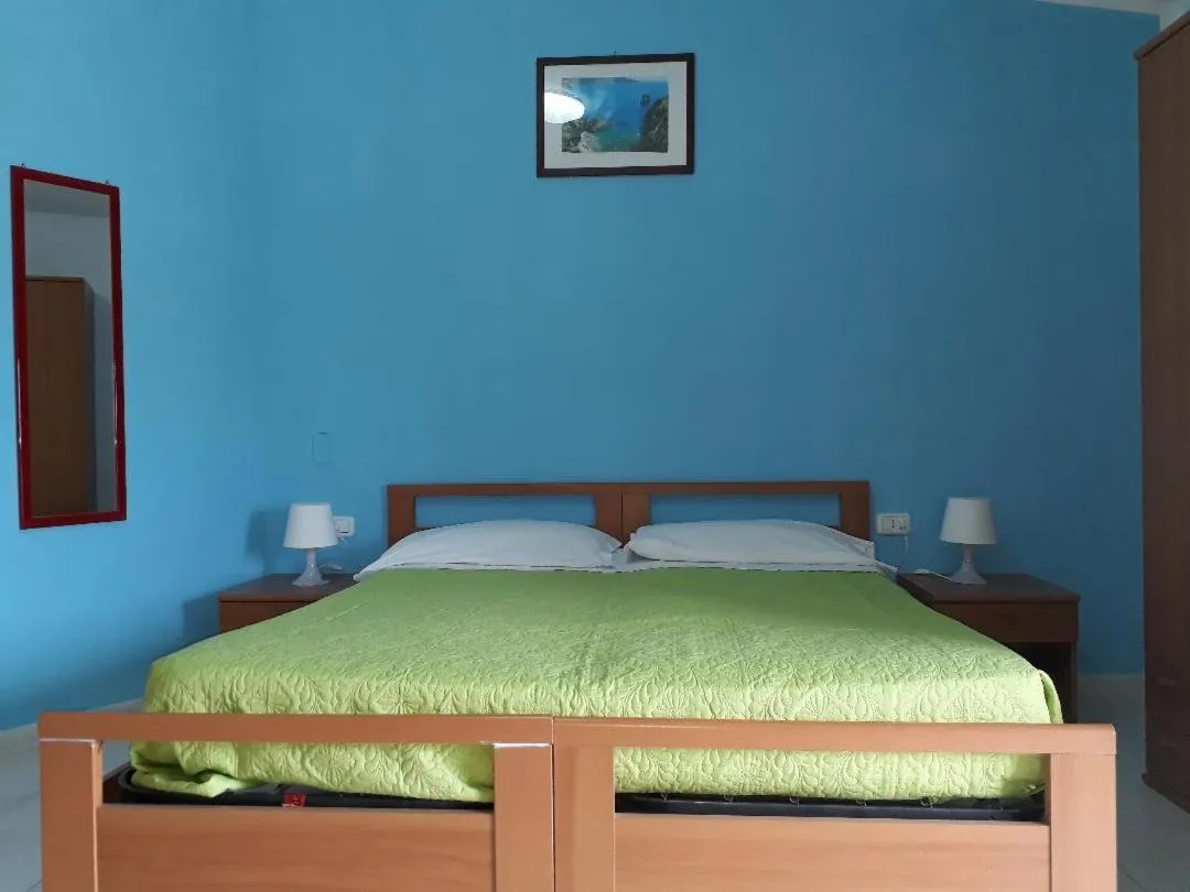 Bed in Pensione Nettuno