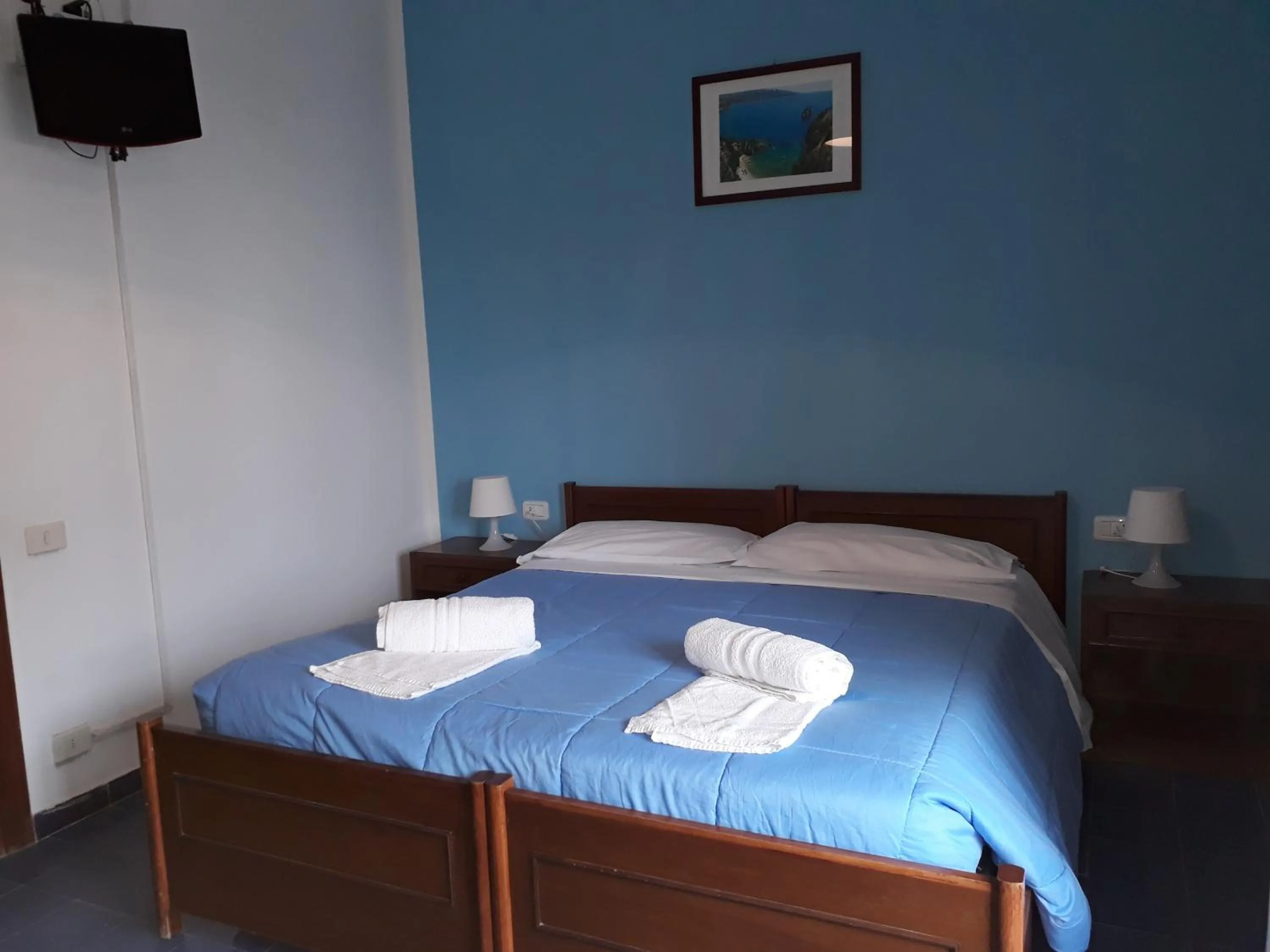 Bed in Pensione Nettuno