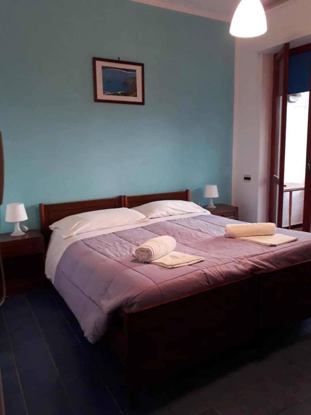 Bed in Pensione Nettuno