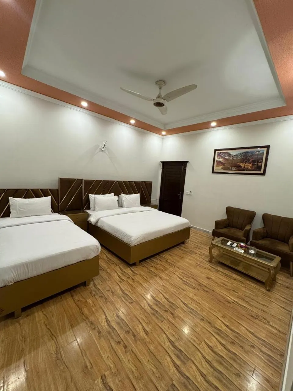 Bed in Travis Executive Guest House Islamabad