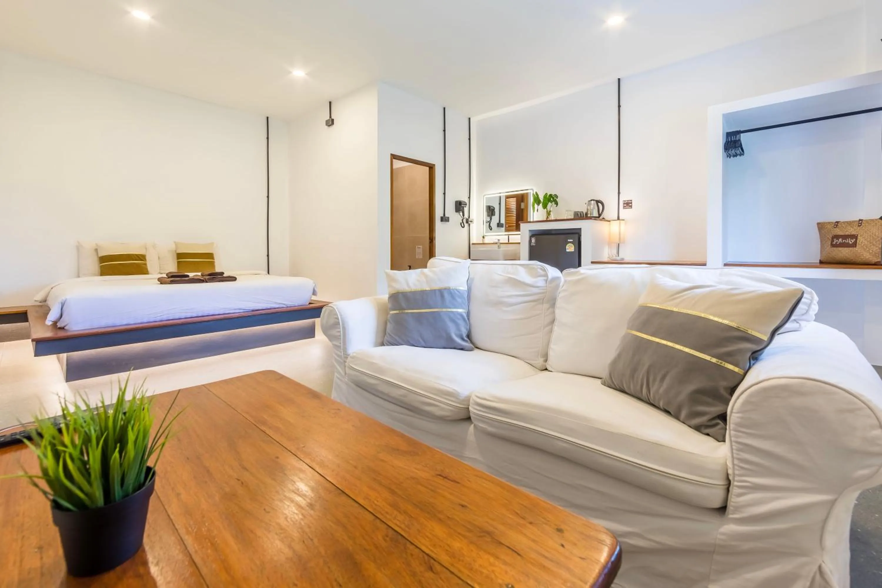 Living room, Bed in Infinity Guesthouse