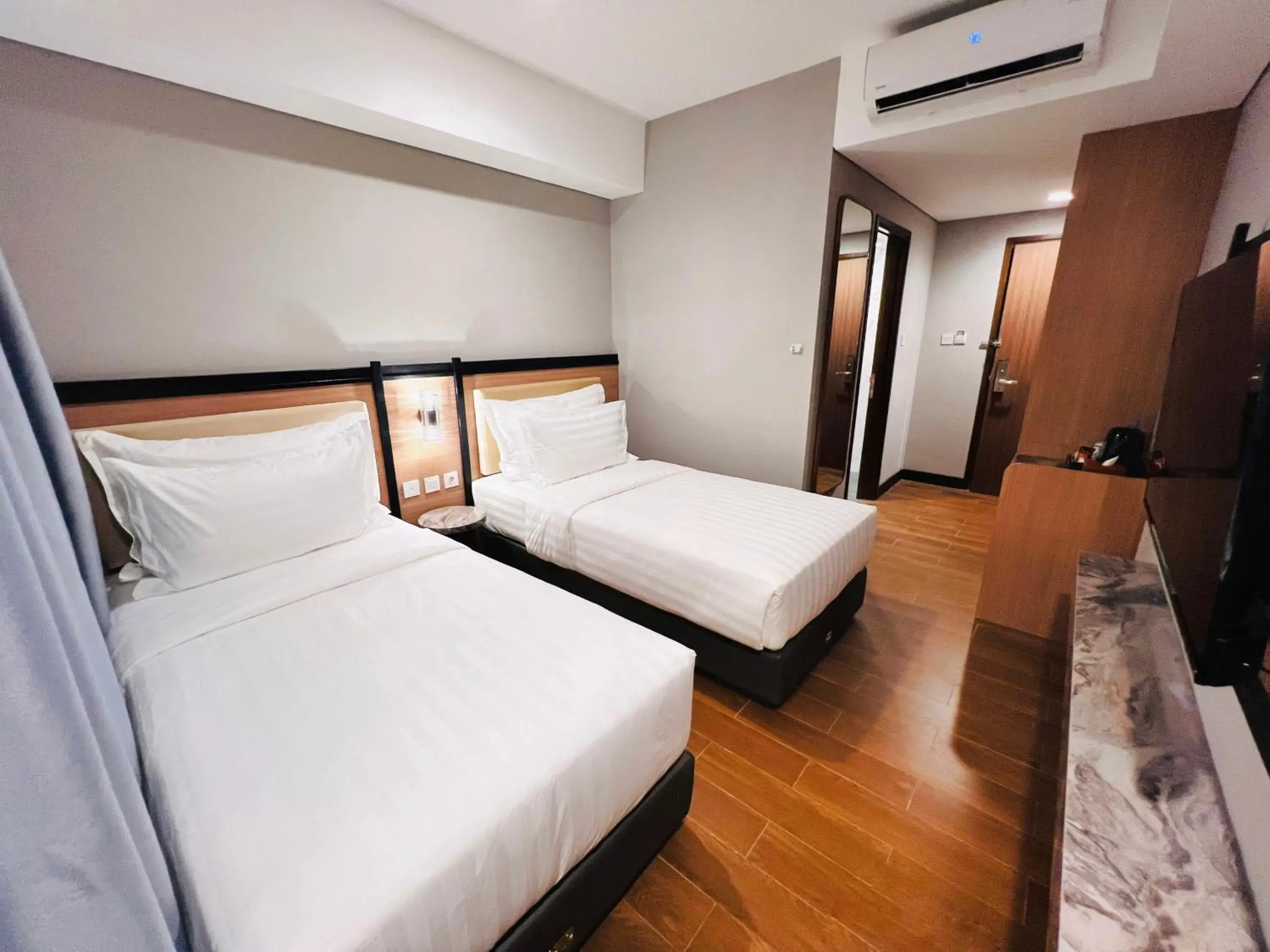 Superior Twin Room in d'primahotel Airport Sultan Hasanuddin Makassar Superior Twin Room in d'primahotel Airport Sultan Hasanuddin Makassar