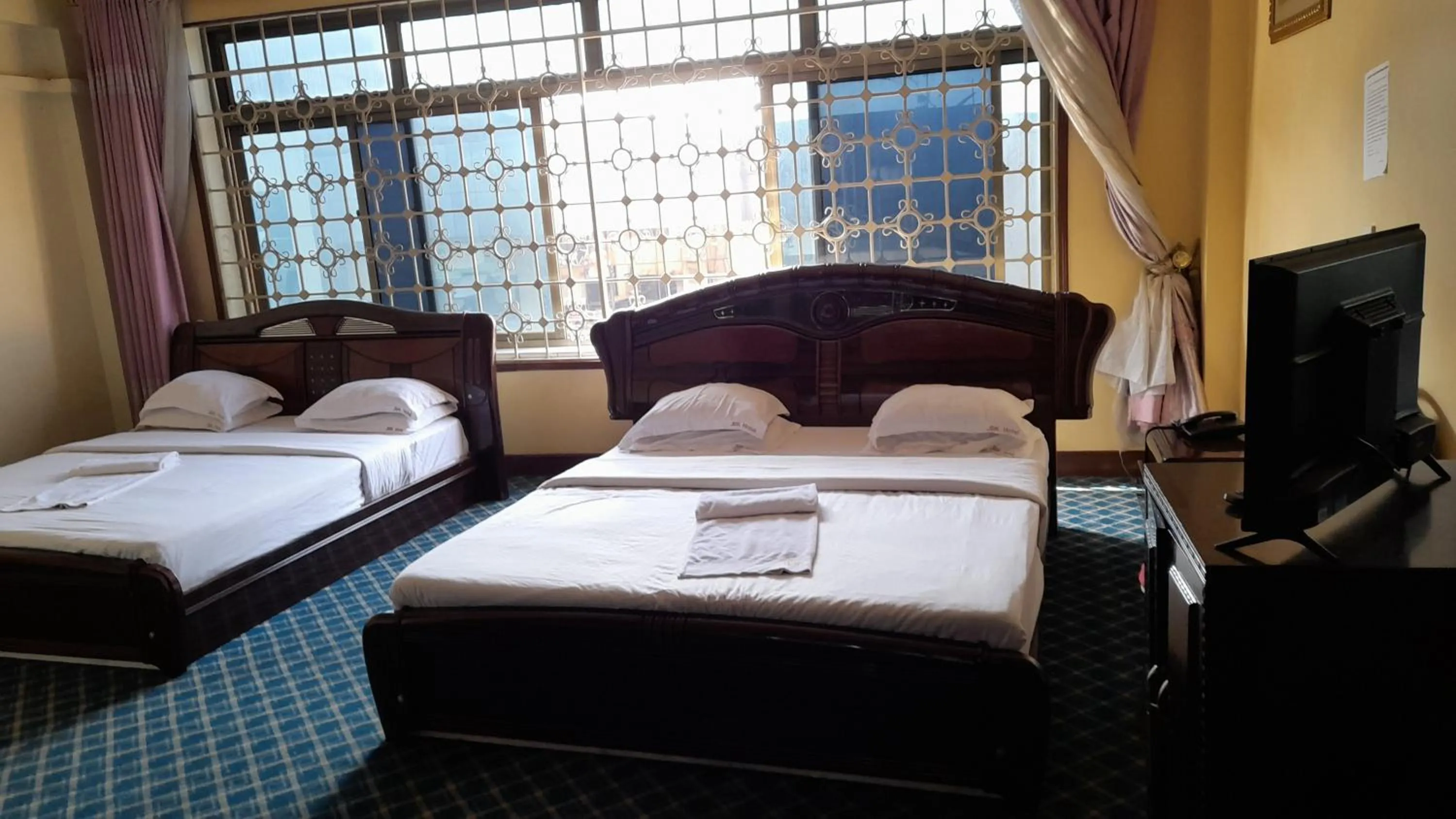 Bed in New JBK Hotel