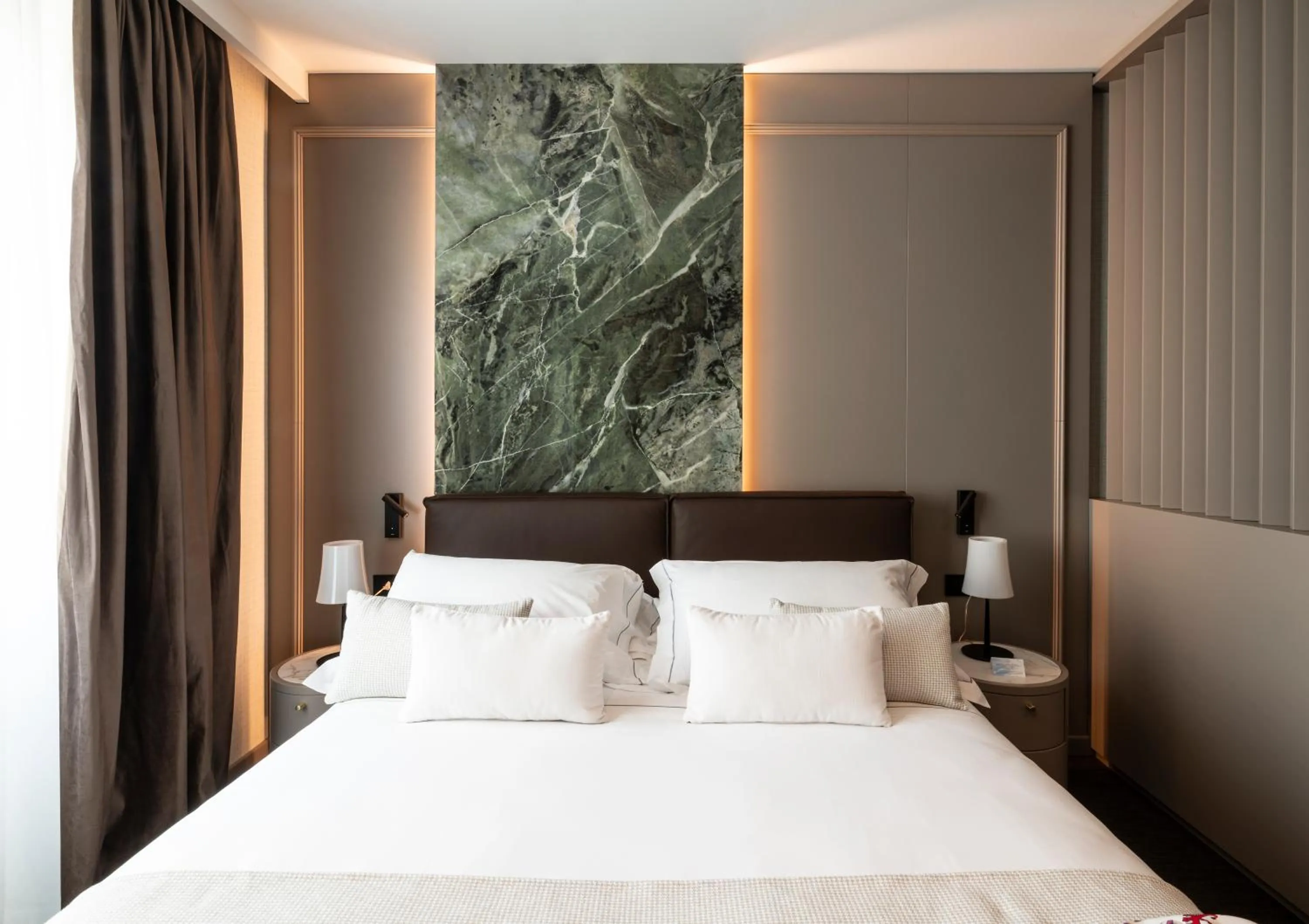 Bed in Duomo Hotel & Apartments