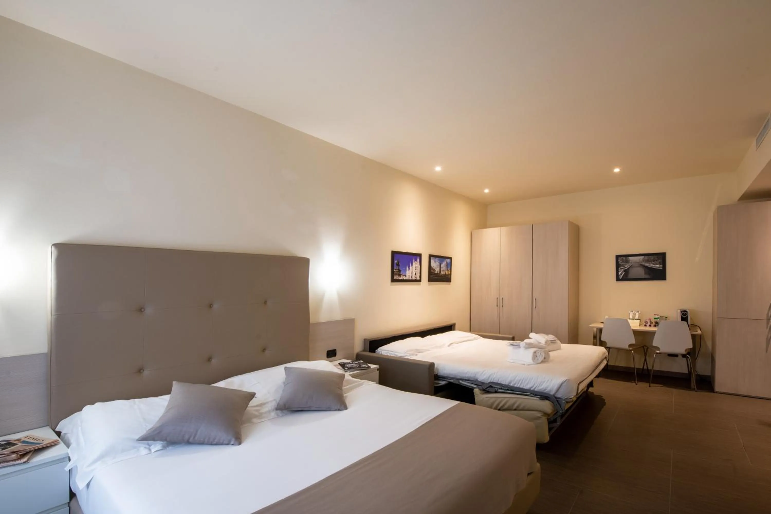 Bed in Duomo Hotel & Apartments