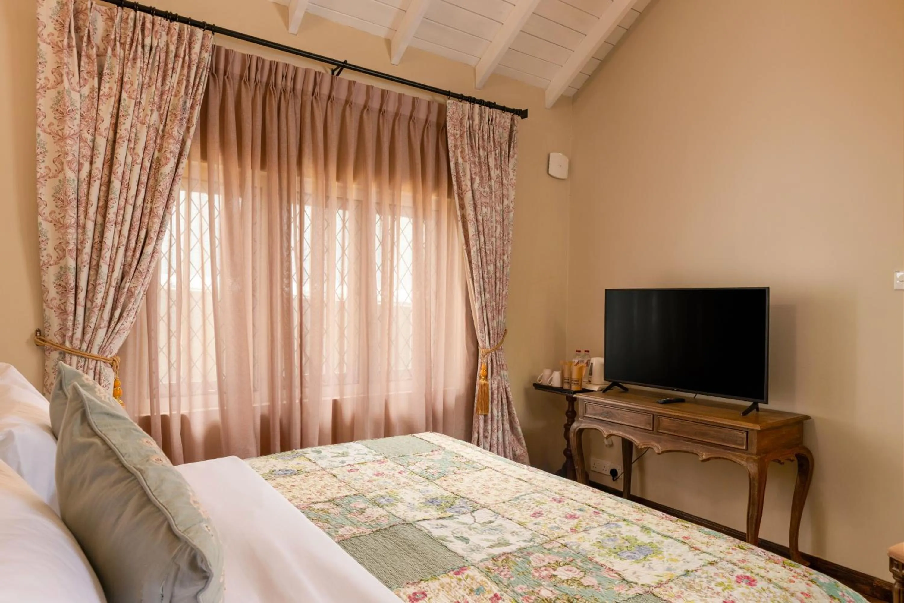 Bed in Grand Bungalow Nuwara Eliya by Seven Angels