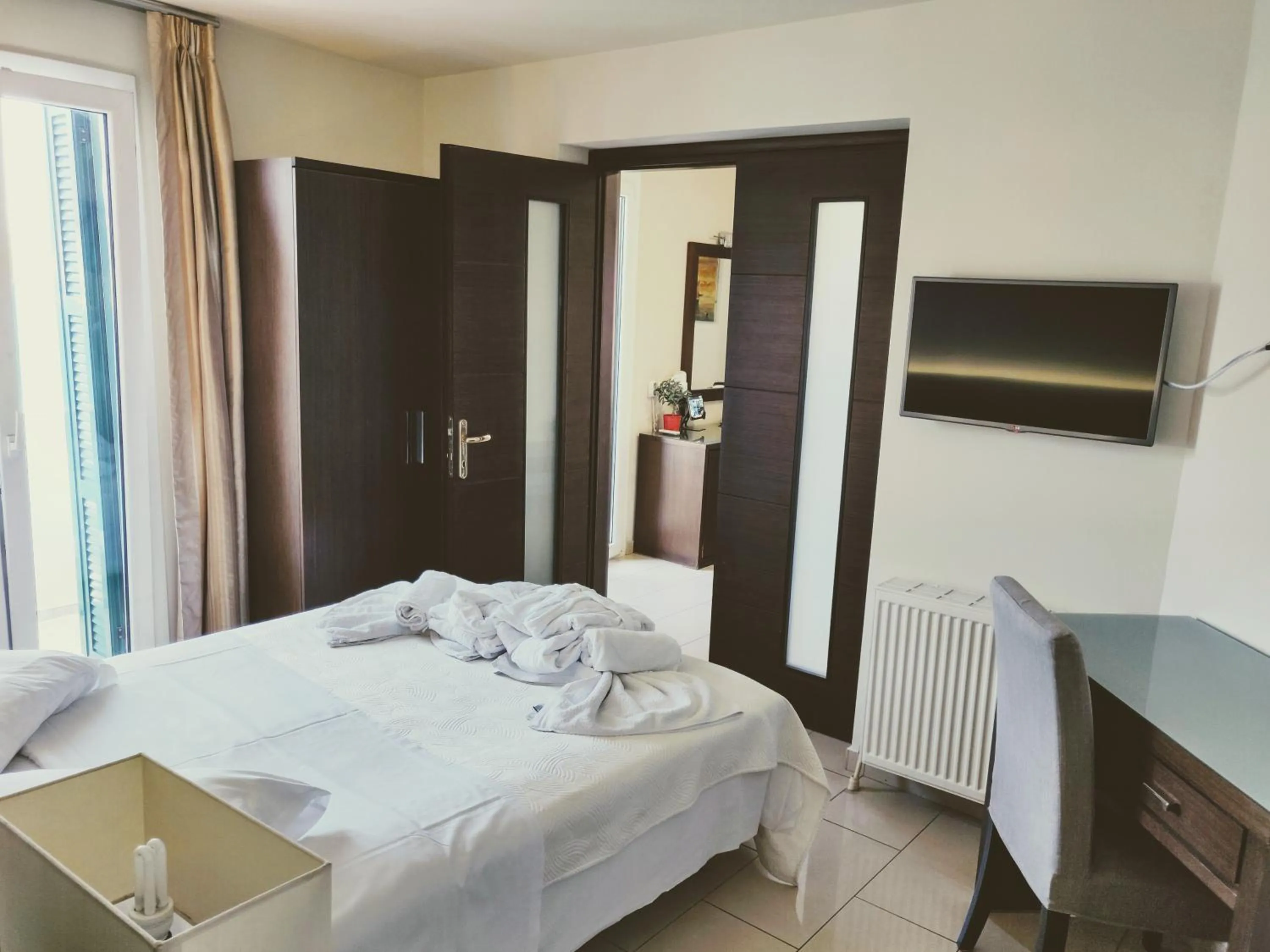 Photo of the whole room, Bed in The Manessi City Boutique Hotel