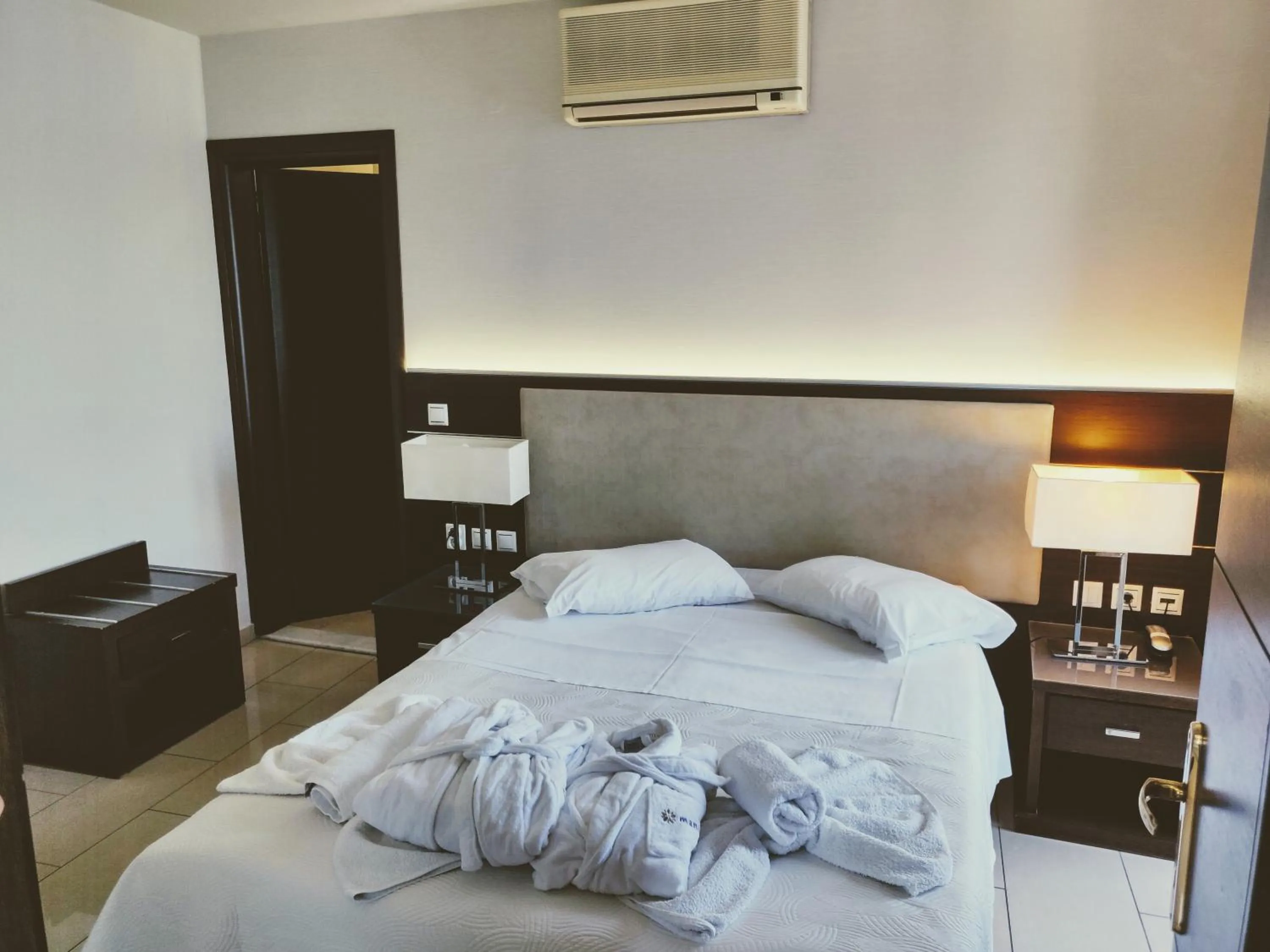 Photo of the whole room, Bed in The Manessi City Boutique Hotel