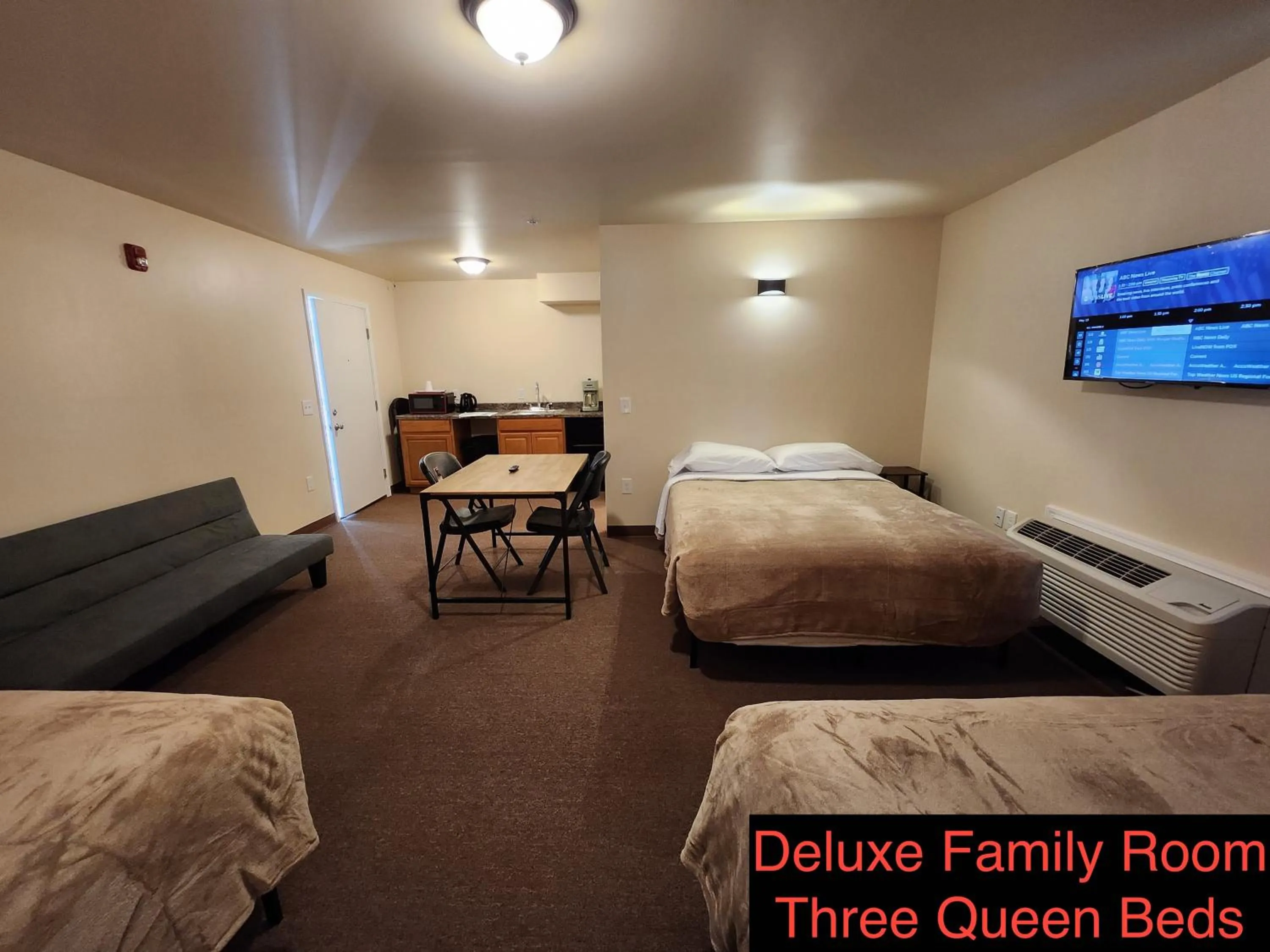 Bed in Stay Inn and Suites