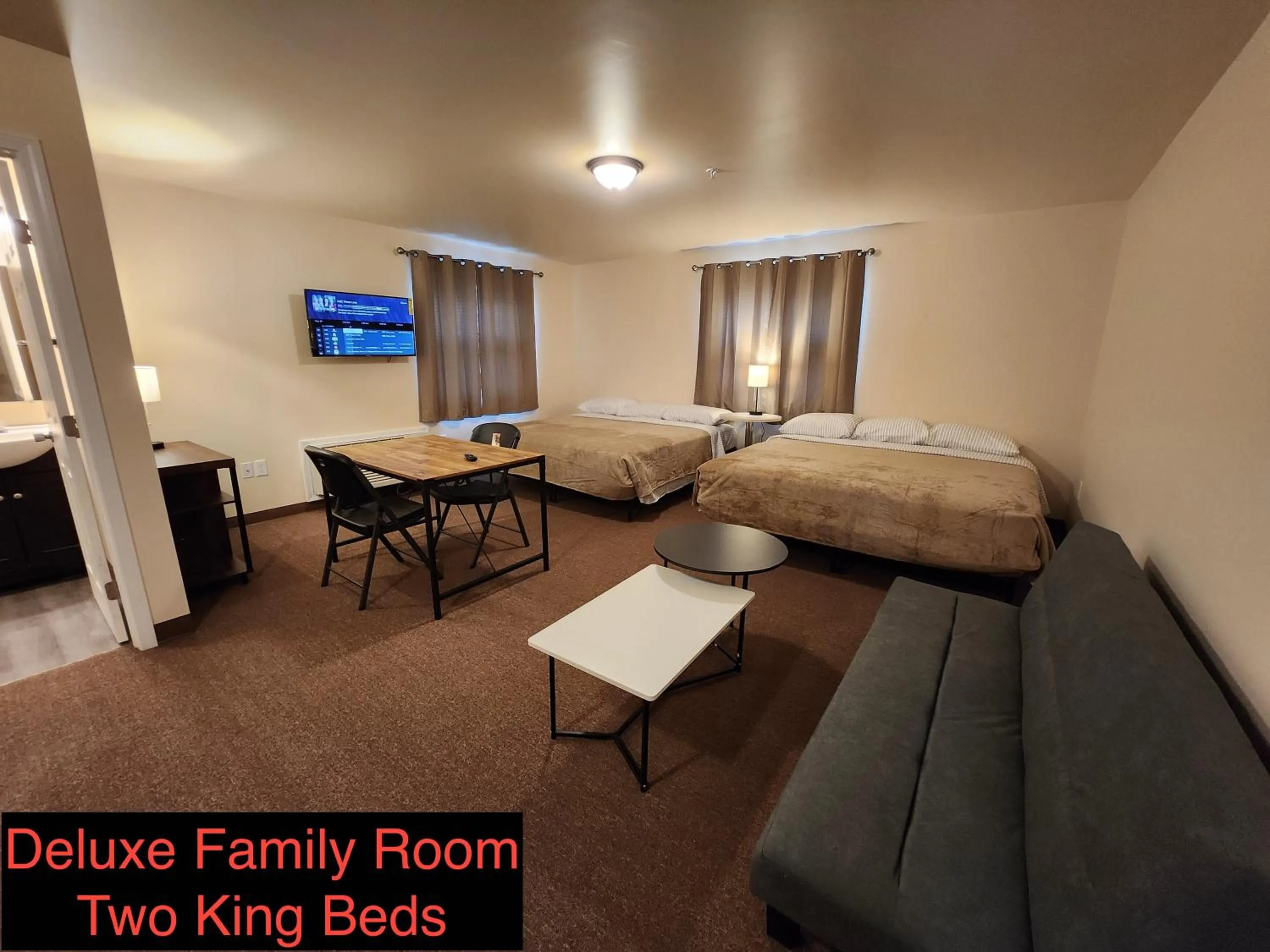 Bed in Stay Inn and Suites