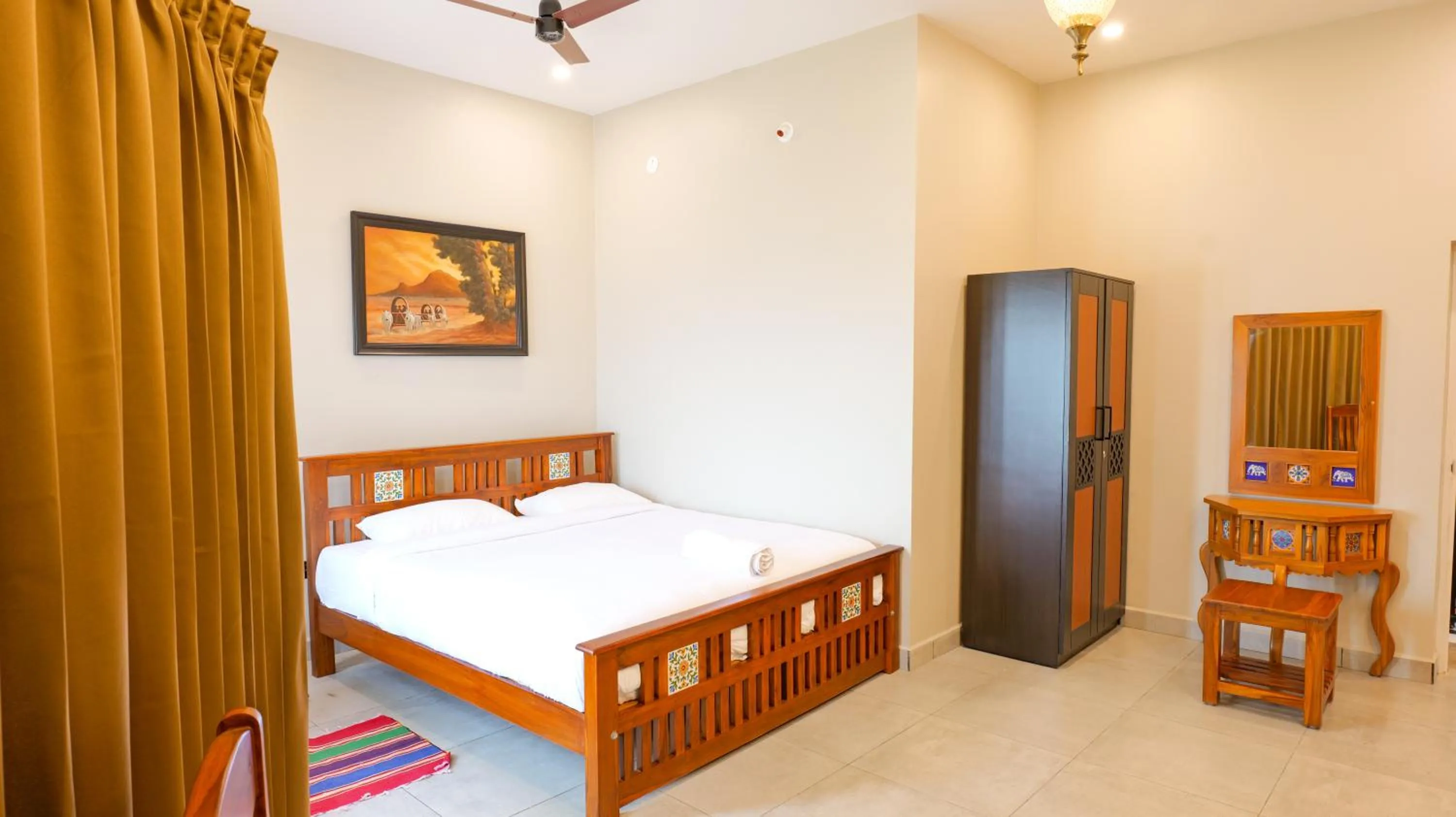 Photo of the whole room, Bed in Dwaraka Resorts