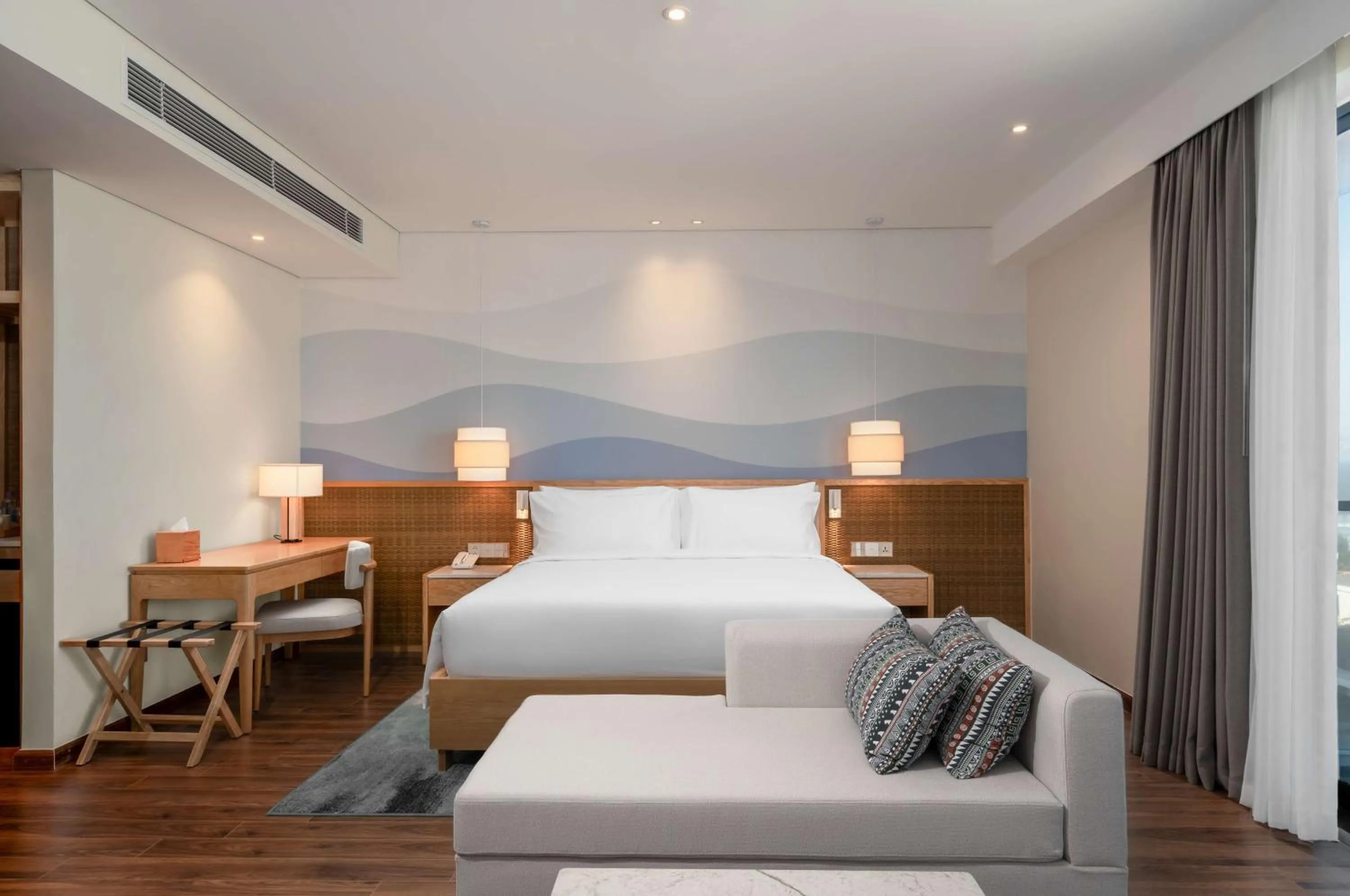 Photo of the whole room, Bed in Radisson Resort Mui Ne