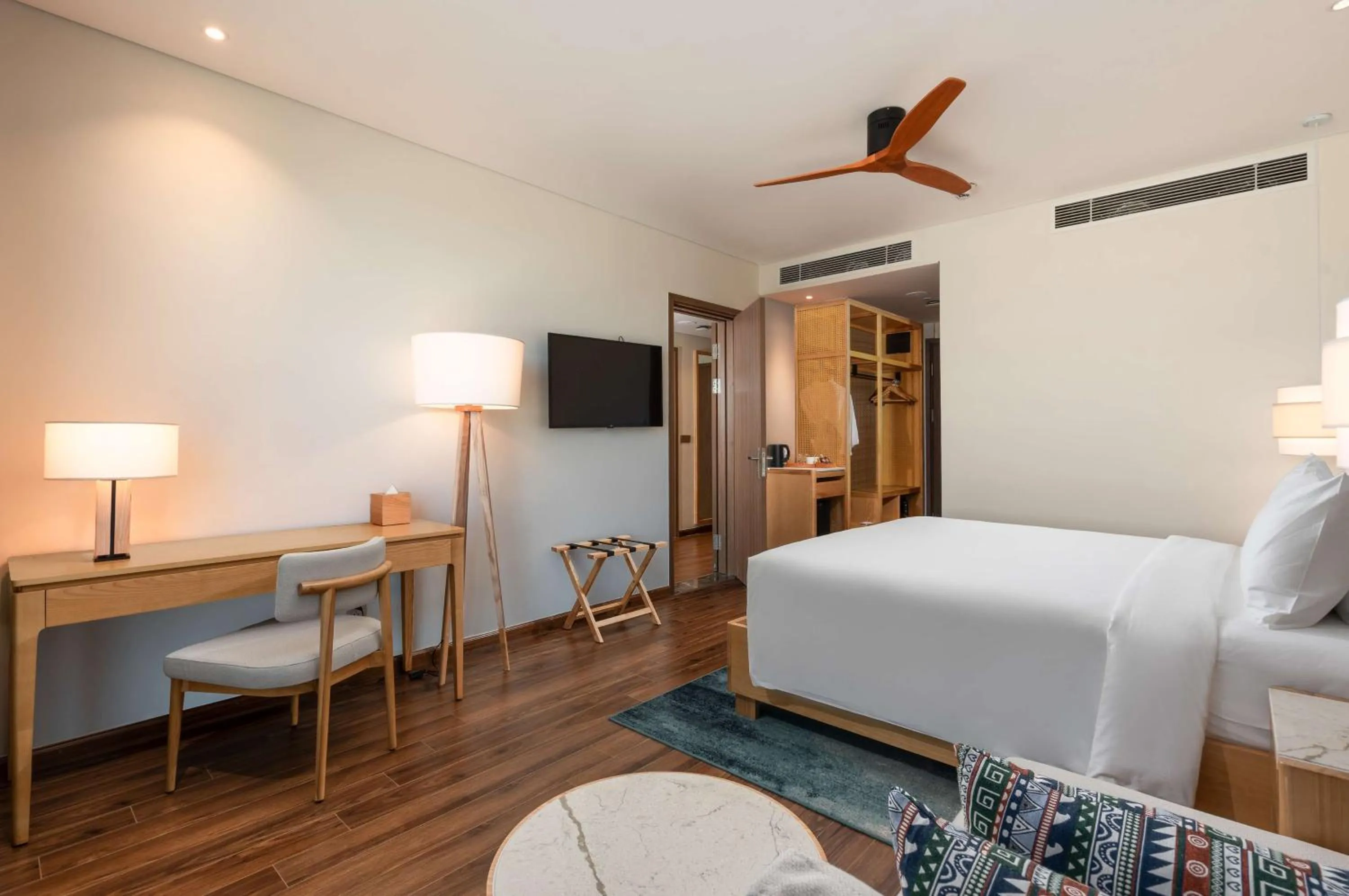 Photo of the whole room, Bed in Radisson Resort Mui Ne