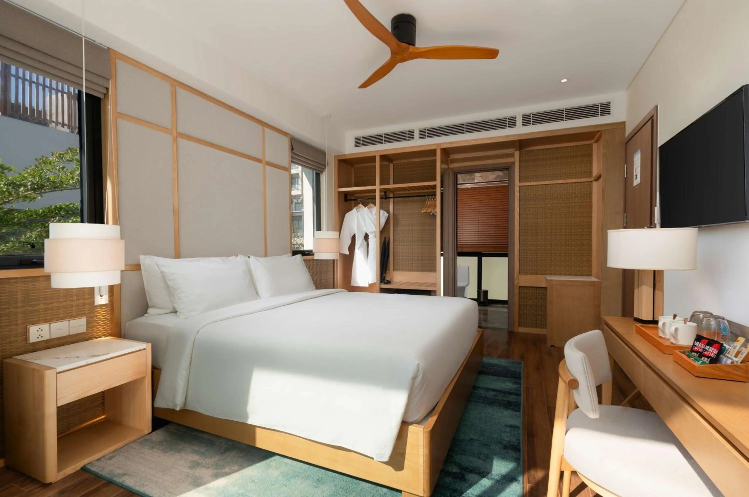 Photo of the whole room, Bed in Radisson Resort Mui Ne