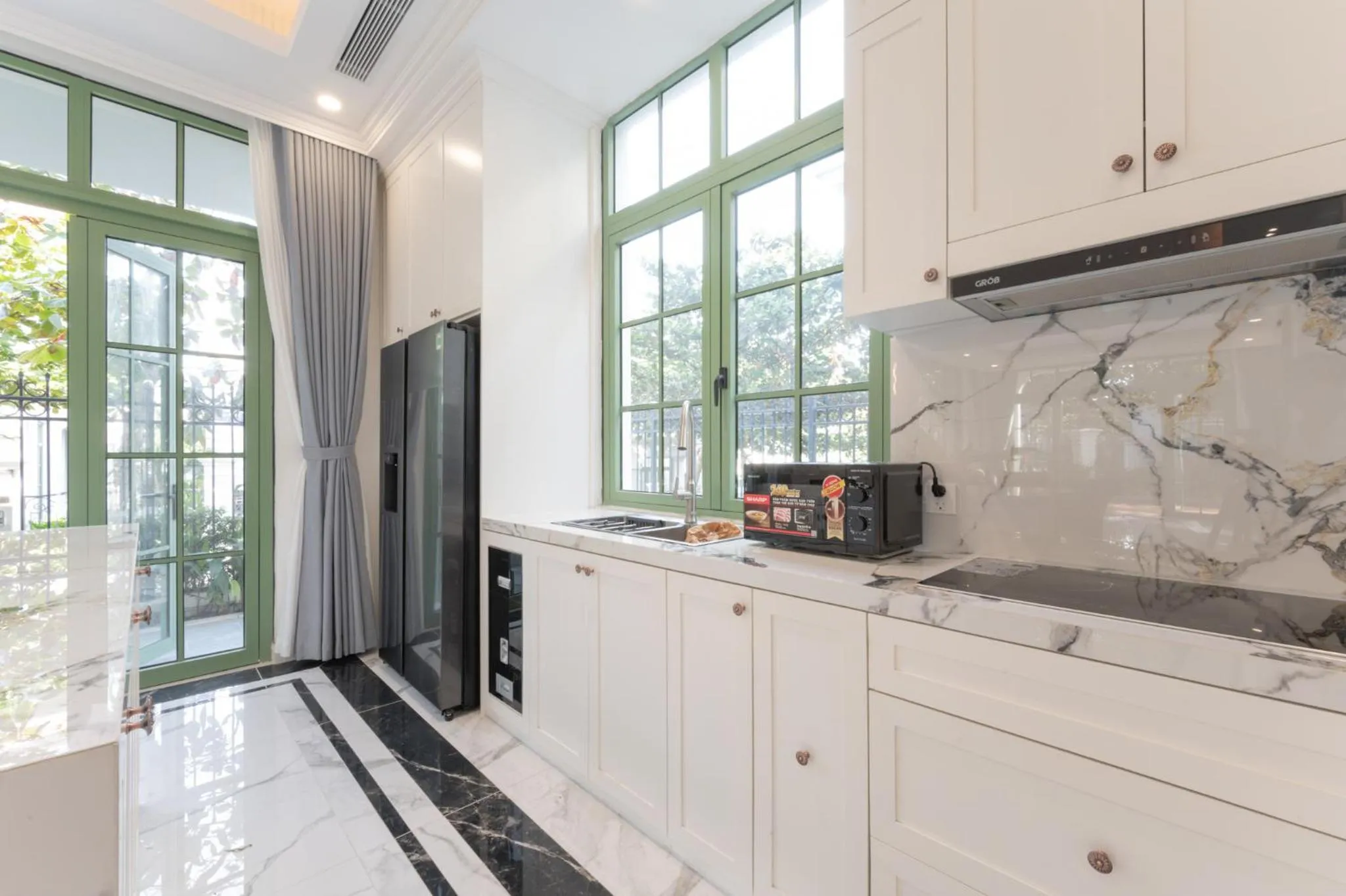 stove in La isla Apartments & Villas - Sea View & Fireworks Phu Quoc