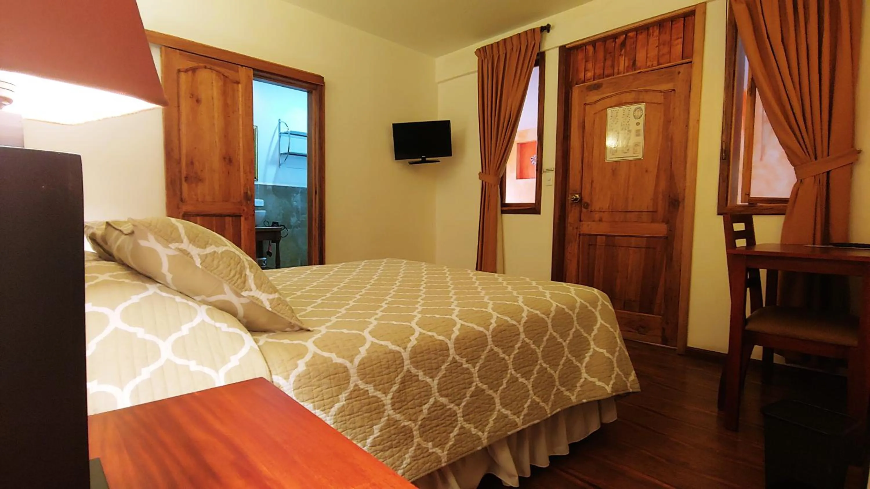 Bed in Hotel Boutique Casa Montalvo Cuenca