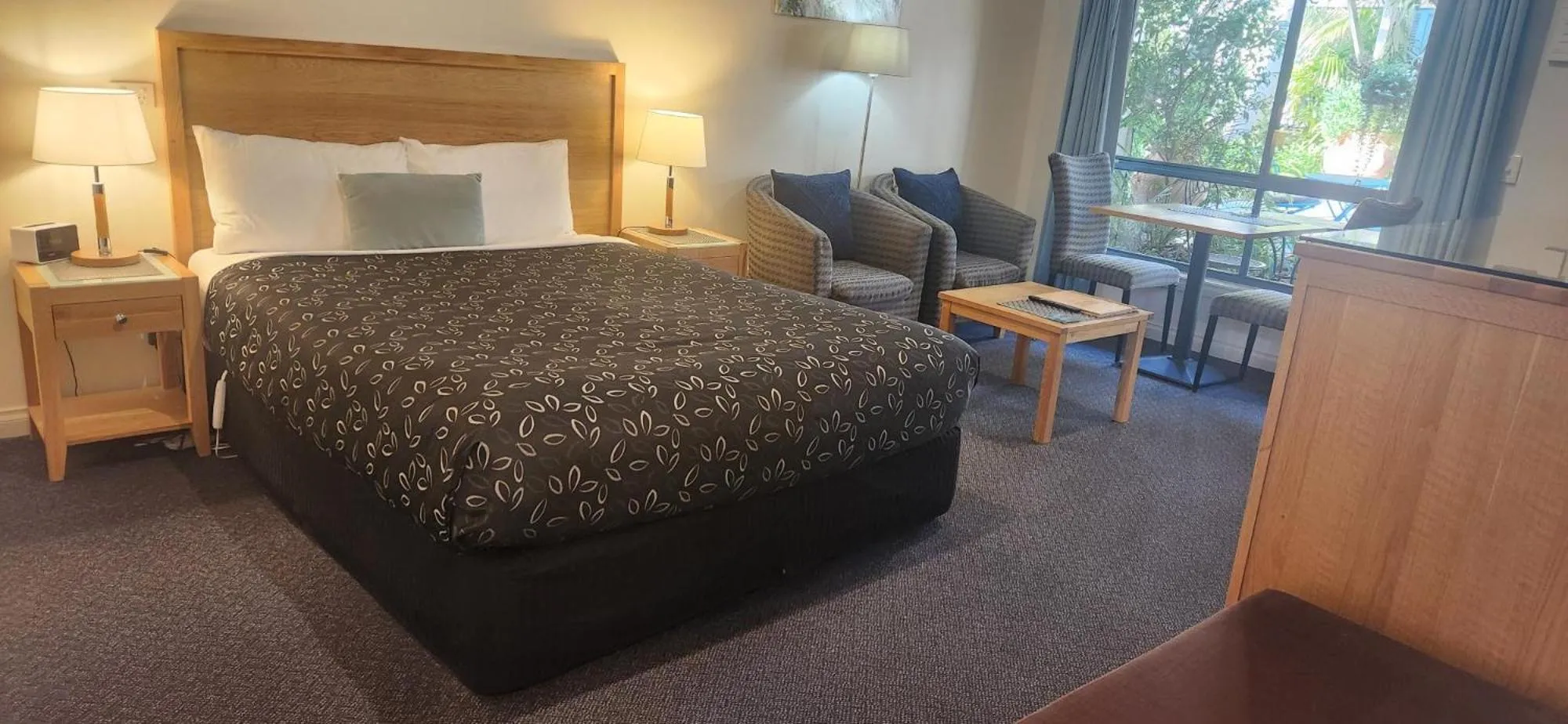 Living room, Bed in Motel On A'Beckett