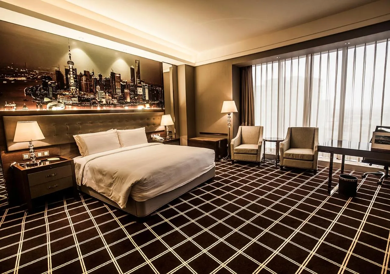 Bed in Royal Century Hotel Shanghai