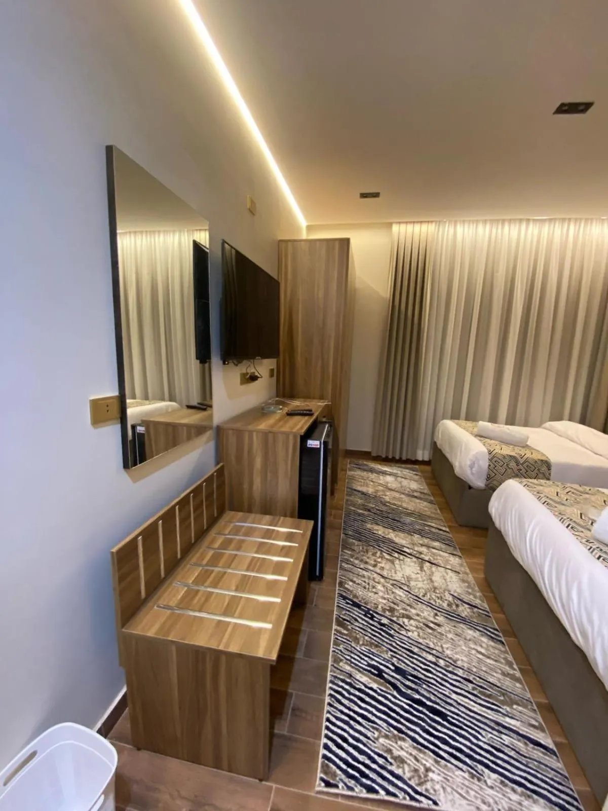 Communal lounge/ TV room, Bed in Golden Season Hotel