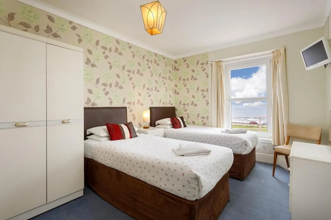 Bed in Cherry Tree Hotel