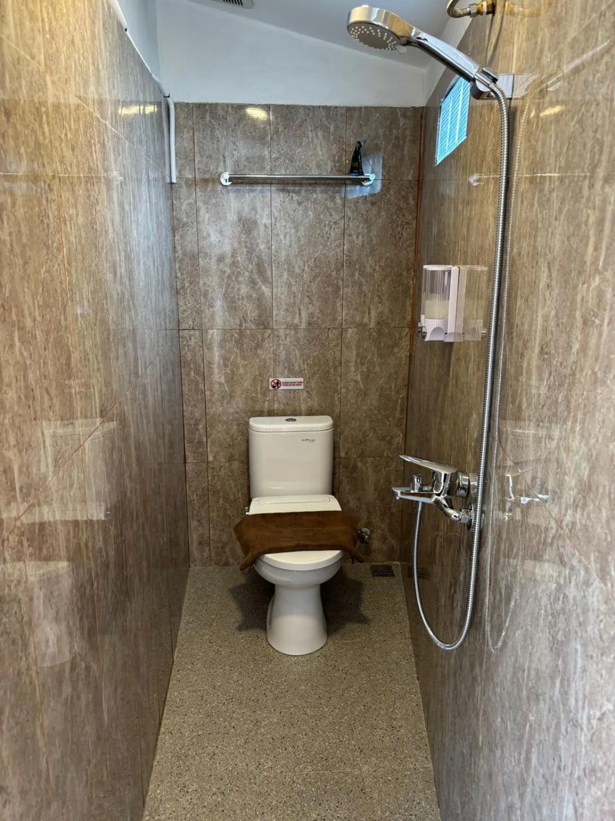 Shower in Alit Guest House