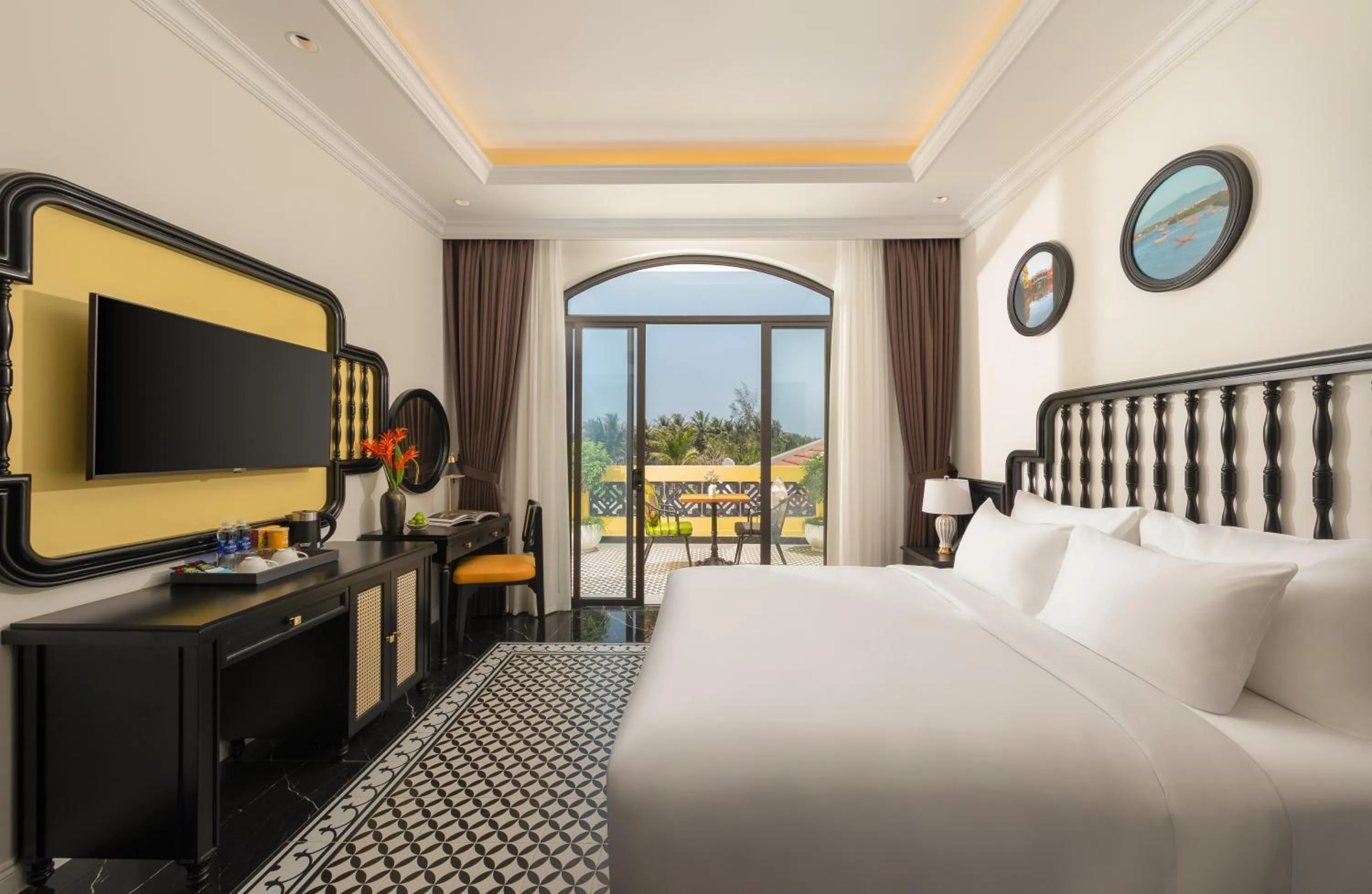 Bed in Nesta Hoian Resort & Spa